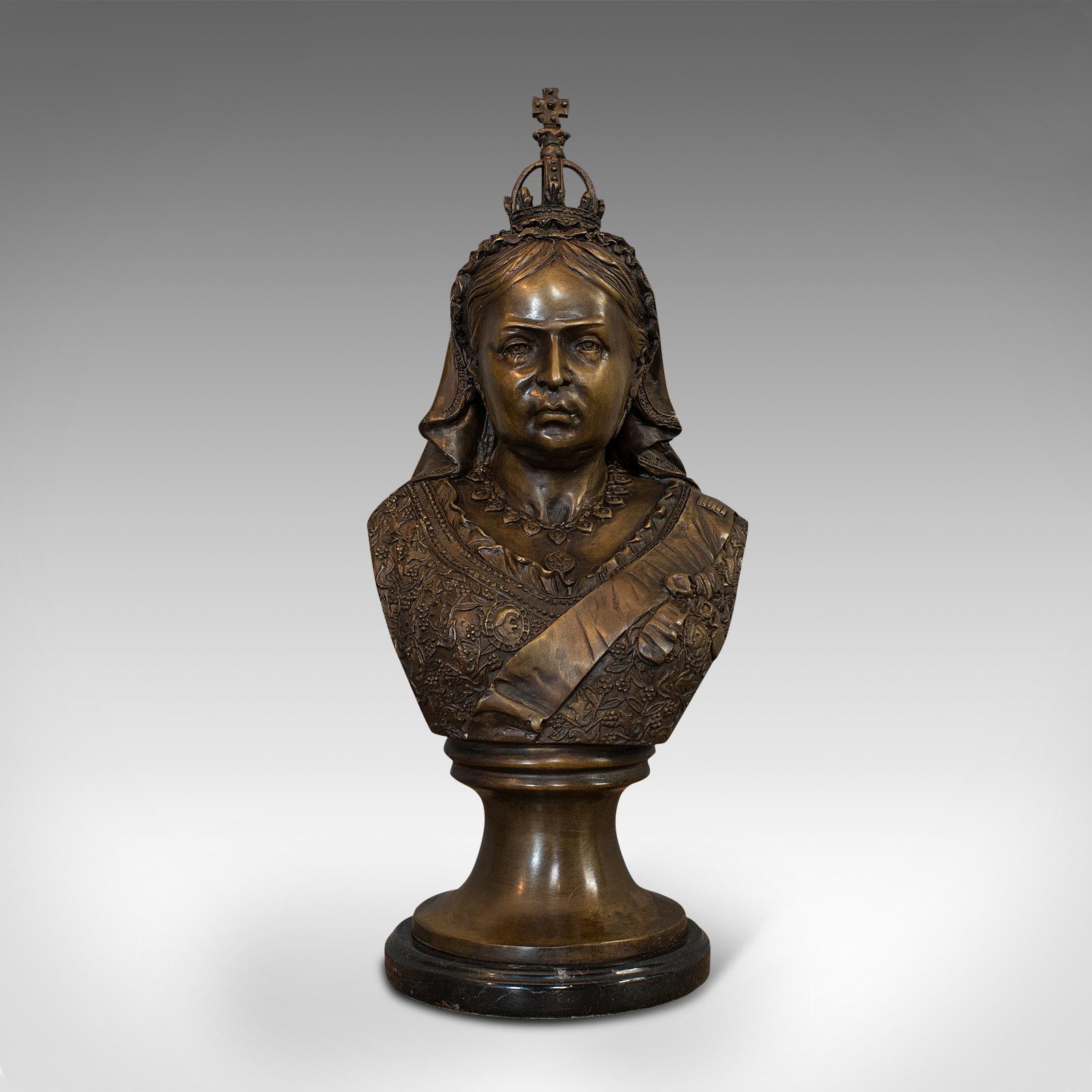 This is a vintage bust of Queen Victoria. An English, bronze, decorative Royal portrait of the long-serving monarch and Empress of India, dating to the 20th century.

An enduring icon of the British monarchy
Displays a desirable aged