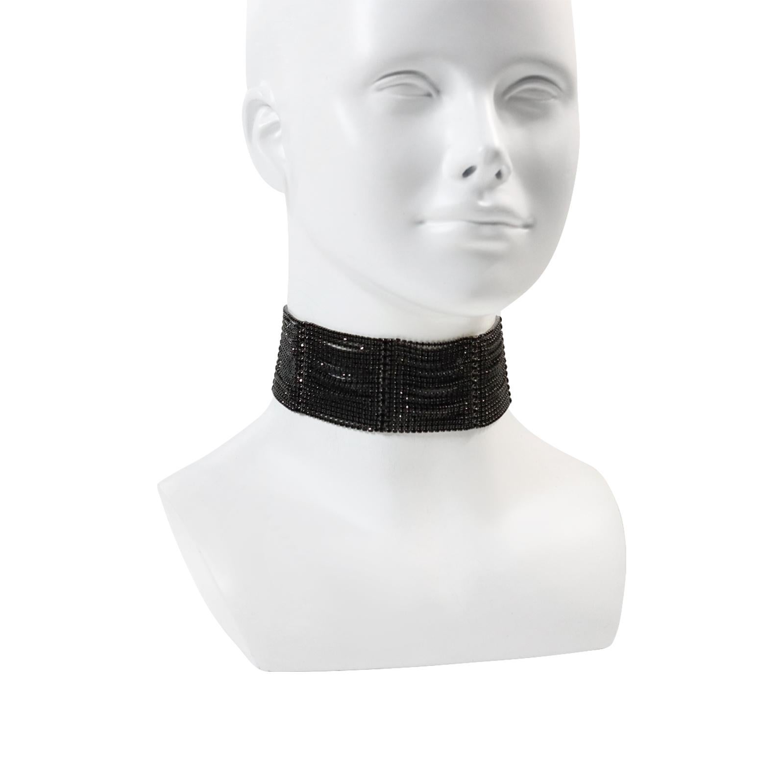 Vintage Butler and Wilson Black Diamante Wide Choker Circa 1990s.  Such a gorgeous piece that always looks on trend. This can look great for the day with a white shirt or with a ball gown. Looks amazing and comfortable to wear.

12.5