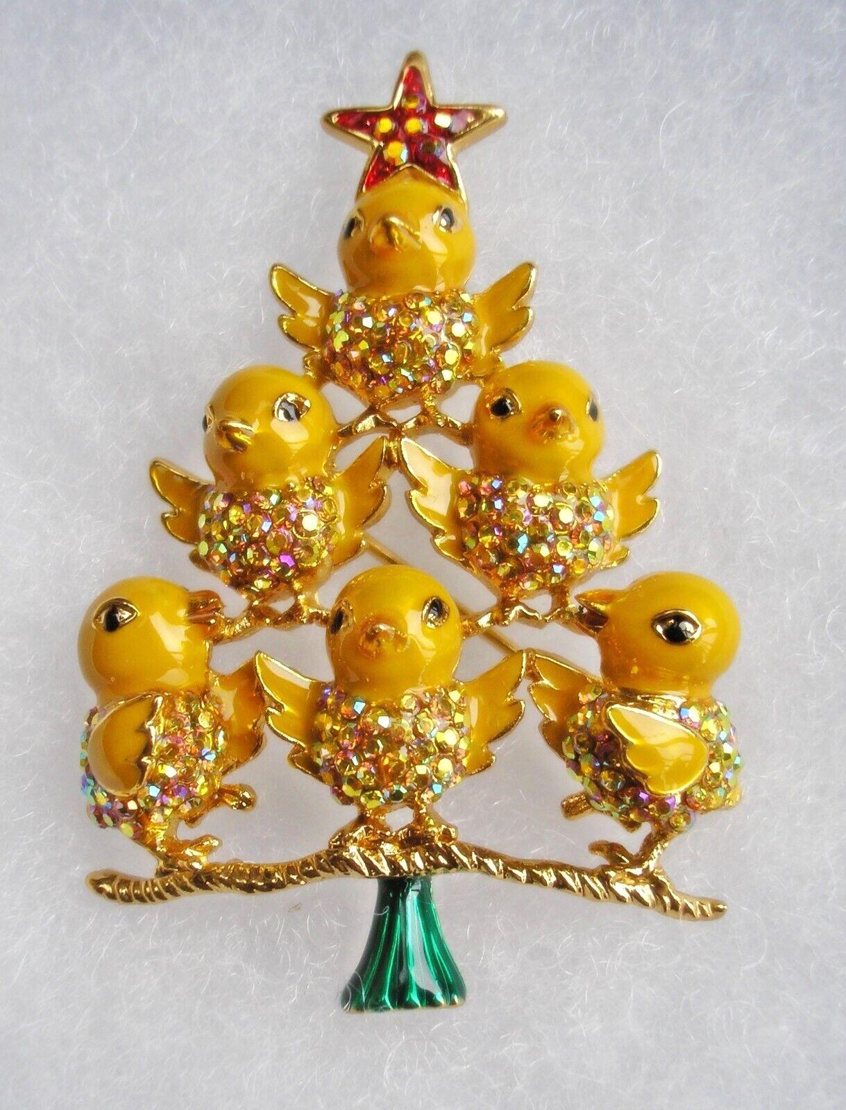 Simply Beautiful! Butler & Wilson BW Designer Signed Christmas tree composed of Yellow Chicks set with Aurora Borealis stones and topped by a Red Star. In Gold tone mounting. Measuring approx. 2.5” high. Perfect, new condition. More Beautiful and