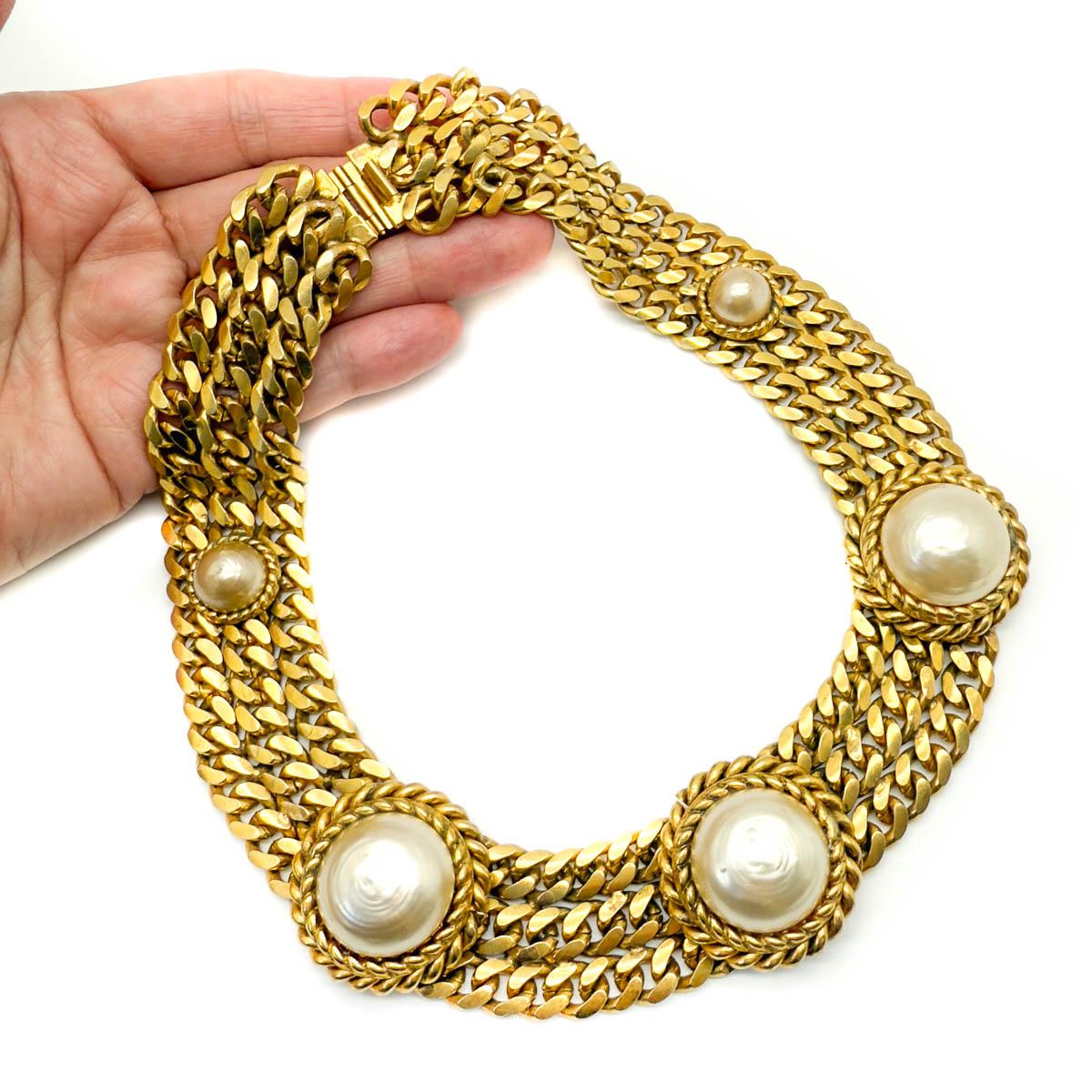 An exemplary Vintage Butler & Wilson Pearl Collar hailing to the glorious 1980s and a style featured in B&W's wonderful book 'Rough Diamonds'. A weighty and chunky triple chain link collar is adorned with large glass baroque pearls. A seriously