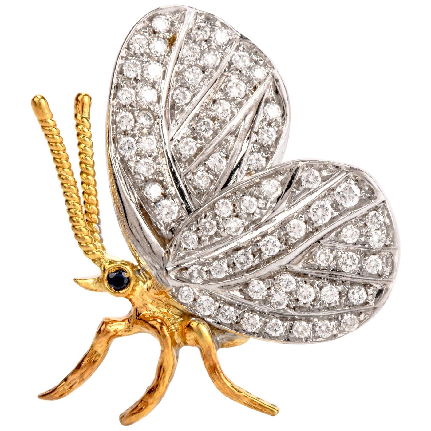 This exquisite Vintage butterfly pin celebrates the beauty and marvel of nature, with spectacularly detailed wings that are bound to give flight at any moment! Finely crafted in solid platinum and 18K yellow gold. Its wings are covered with 94 round