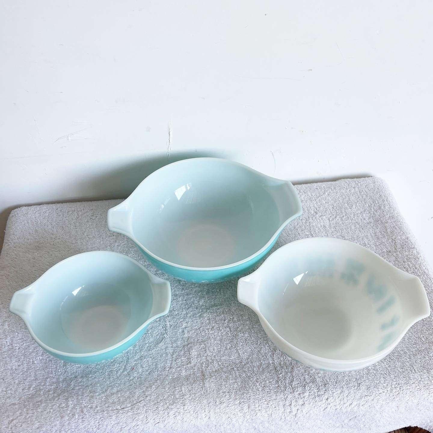 Revive the charm of the past with this delightful set of Vintage Butterprint Bowls by Pyrex. Featuring the iconic 