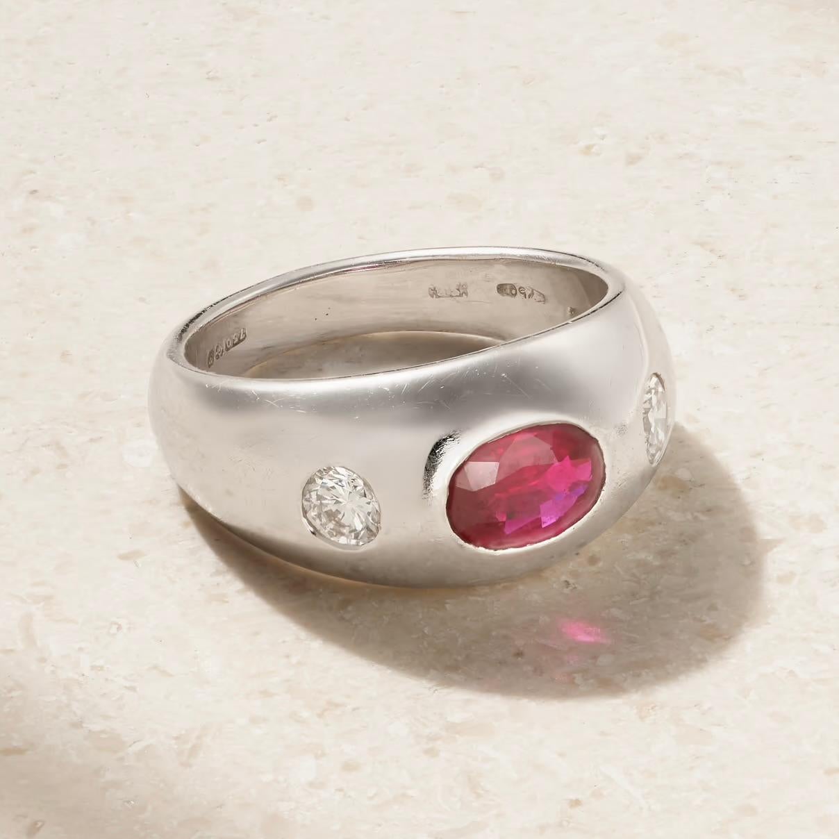 BVLGARI Bulgari vintage 18-karat white gold, ruby and diamond Gypsy ring

Maker: Bulgari / Bvlgari
Period: c.1980s-90s
Material: 18k White Gold, Ruby and Diamond
Weight: 9.2 grams
Ring Size: 6 US

Very good vintage condition. 