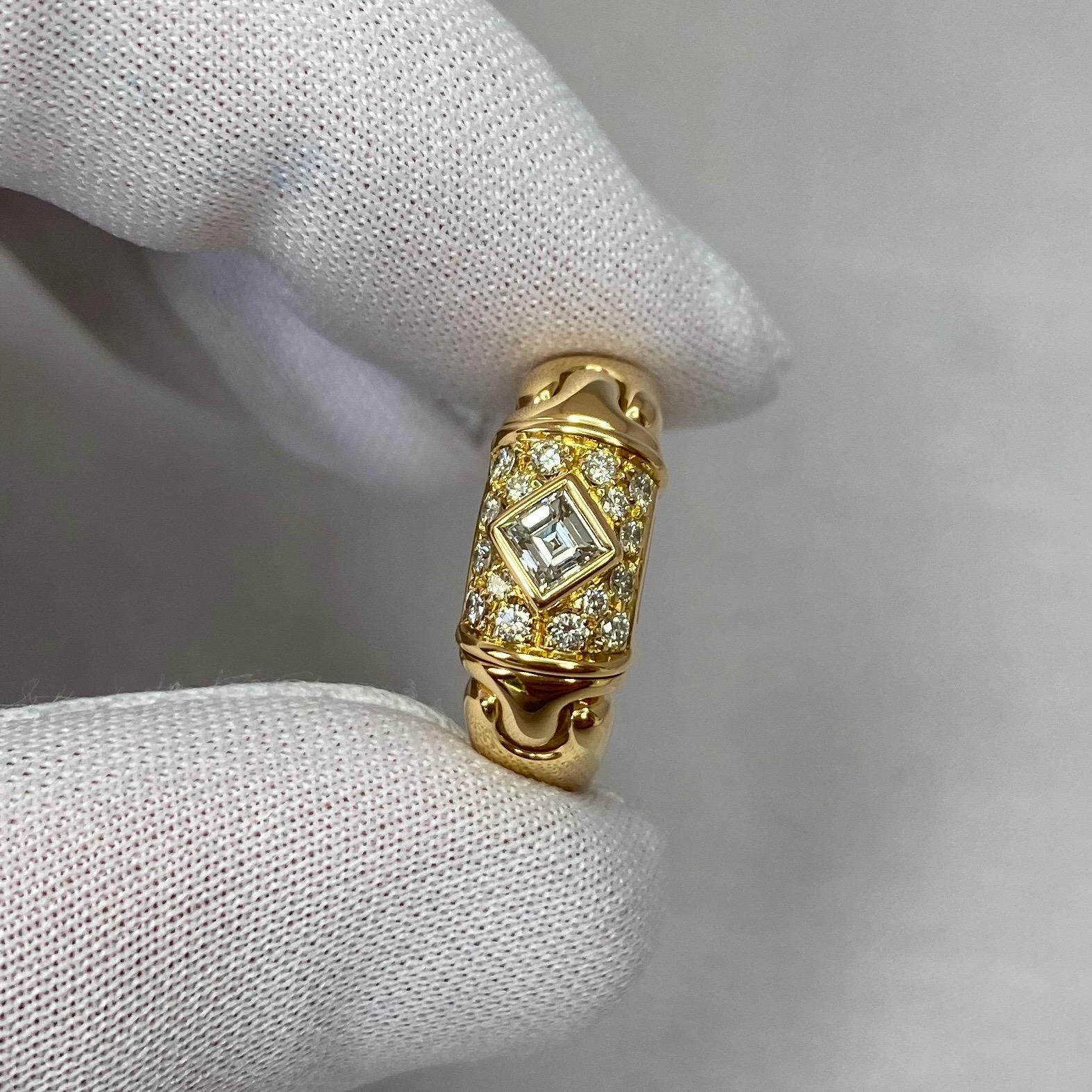 A classic Bvlgari Diamond Ring from the vintage Parentesi range with a beautiful square cut centre diamond surrounded by round brilliant cut diamonds.
The ring is stamped Bvlgari 750 (18k) Made In Italy with Italian hallmarks and Bvlgari serial