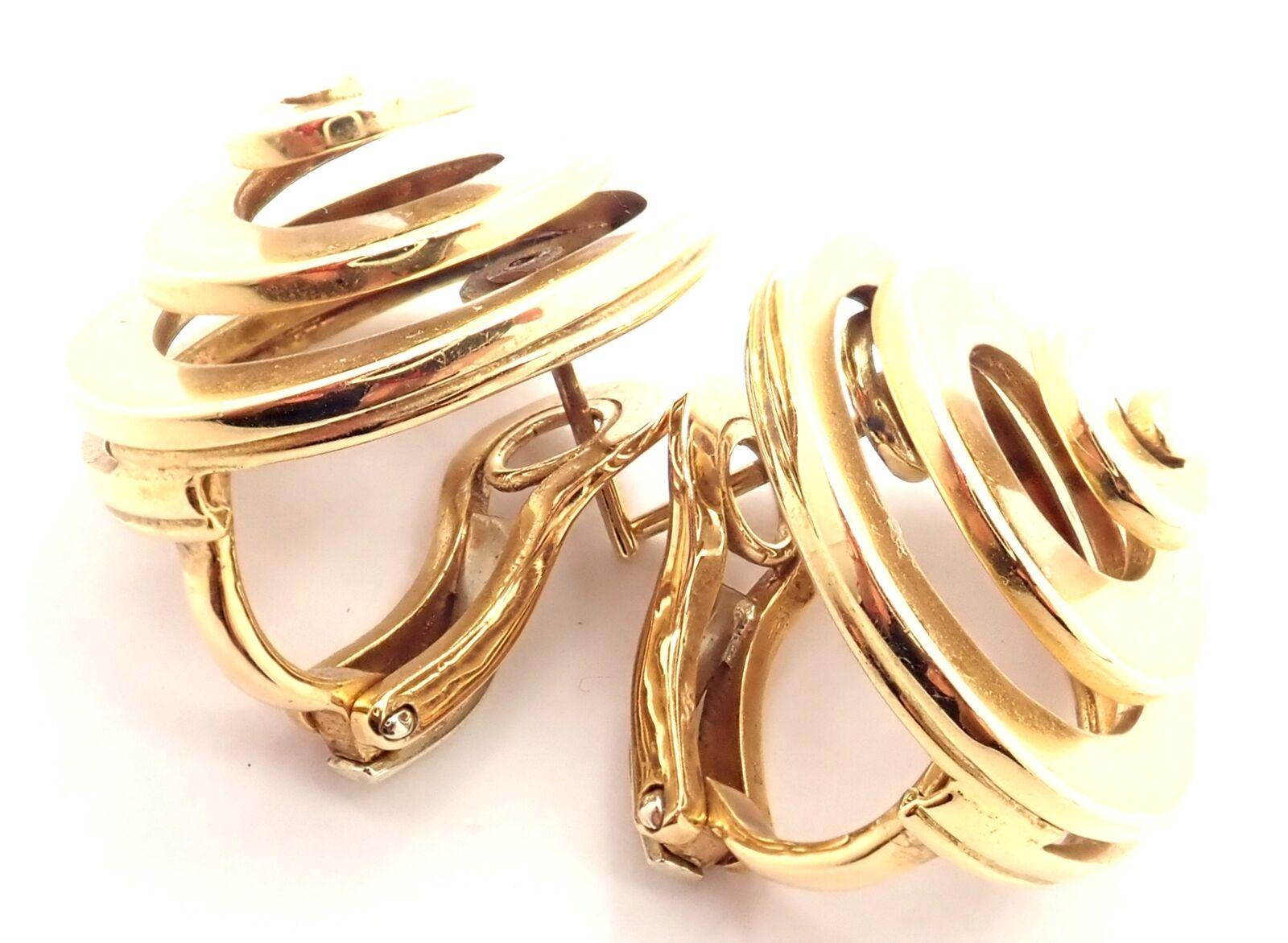 18k Yellow Gold Vintage Swirl Earrings by Bulgari. 
These earrings are made for pierced ears.
Details: 
Measurements: 21mm
Weight: 18.4 grams
Stamped Hallmarks: Bvlgari 750 
*Free Shipping within the United States*
YOUR PRICE: $5,900
T3154ordd