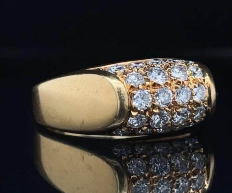 A vintage Bvlgari diamond ring in 18 karat yellow gold, circa 1980.

This ring is set to its oblong shaped centre with five elegant rows of pave set round brilliant cut diamonds for a total of 1 carat approximately, estimated as G-H colour, VS1