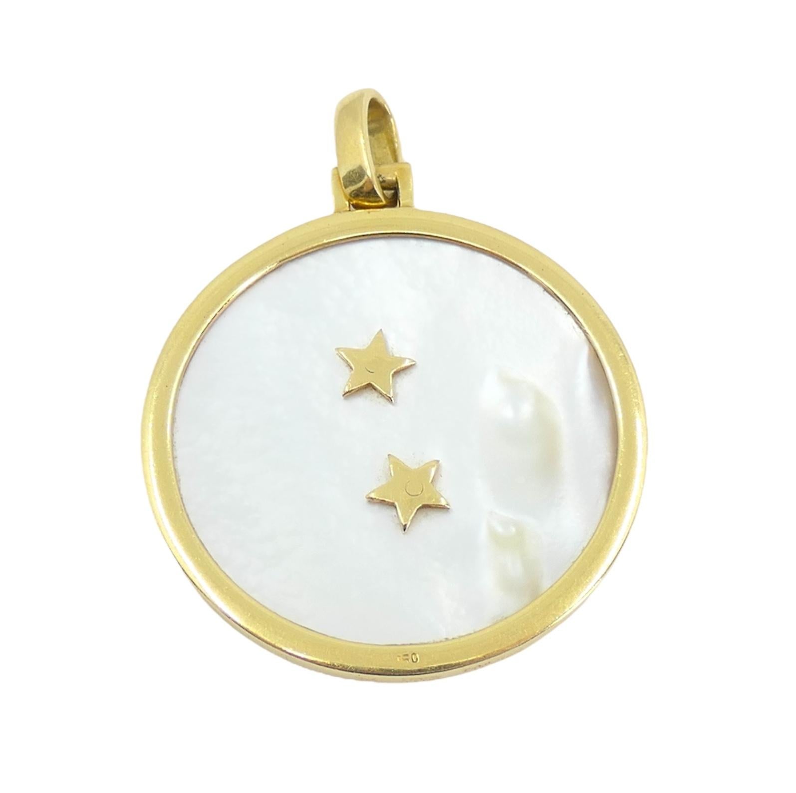 Crafted in the timeless allure of the 1970s, the Vintage Bvlgari Libra Zodiac pendant embodies celestial elegance. Fashioned from lustrous 18k gold and adorned with exquisite mother of pearl, this pendant is a testament to impeccable craftsmanship.
