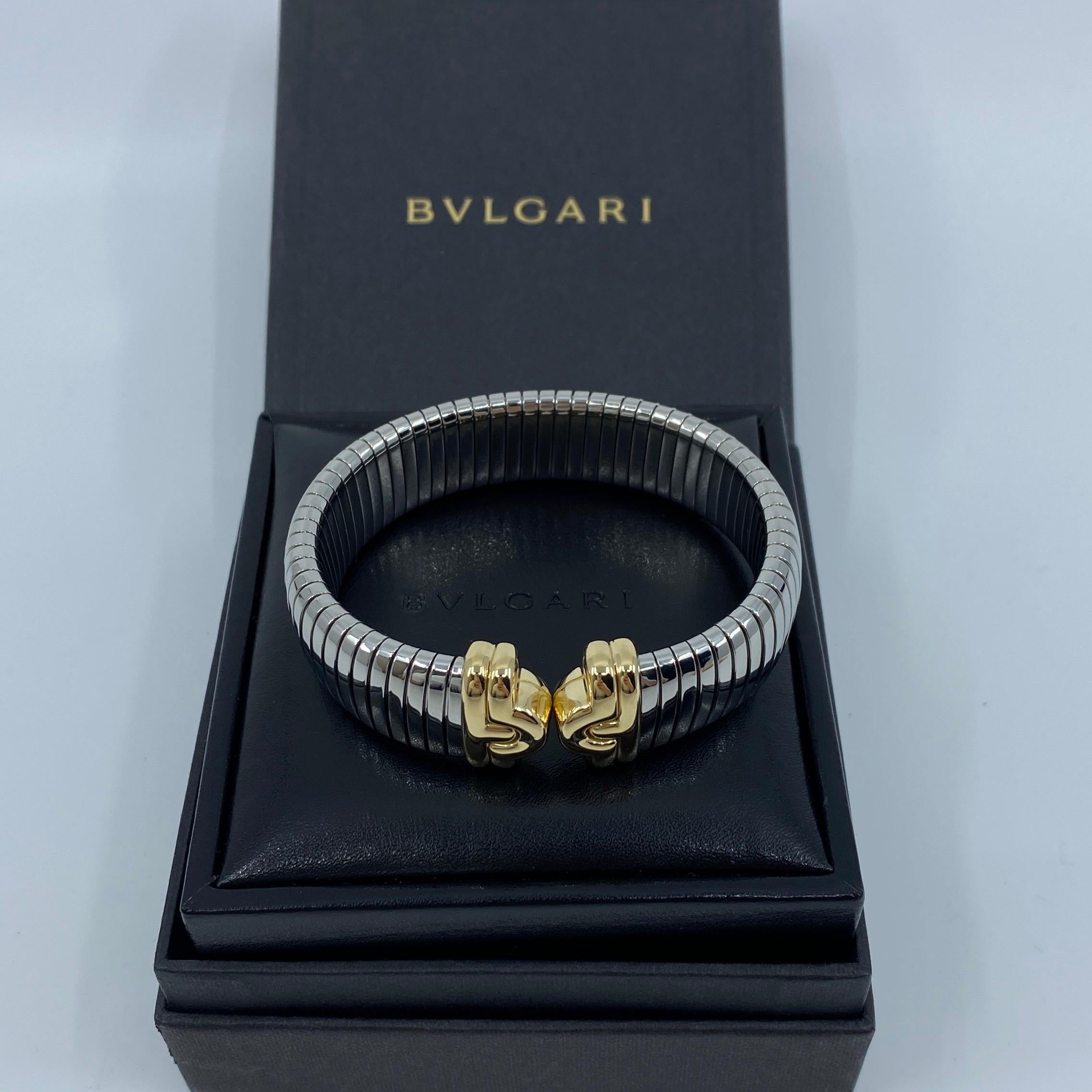 Brazalete vintage Bvlgari Parentesi Brazalete de oro amarillo de 18 quilates y acero inoxidable.

Impresionante brazalete brazalete Bvlgari con el característico estilo Parentesi Tubogas. Cuerpo flexible de la pulsera de acero inoxidable y puntas