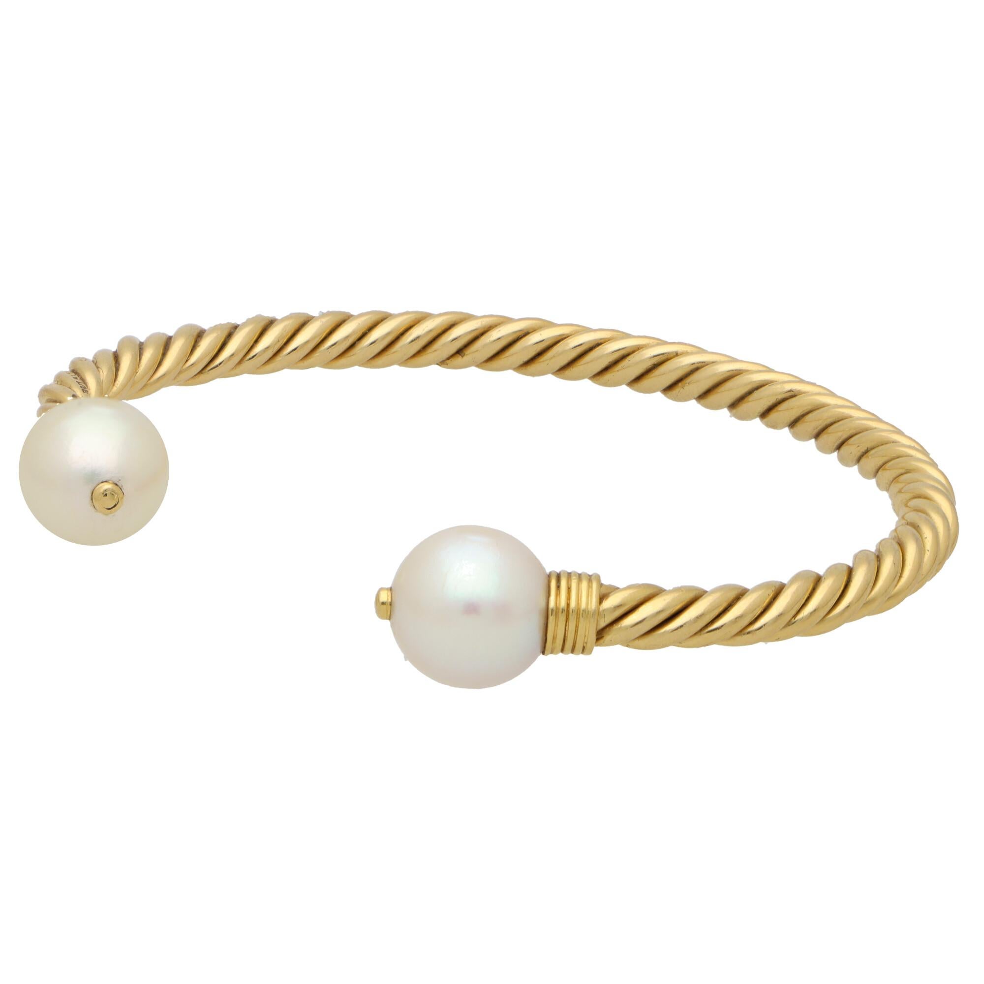 Rétro Bvlgari Bracelet jonc vintage torsadé en or jaune 18 carats avec perles en forme de corde torsadée en vente