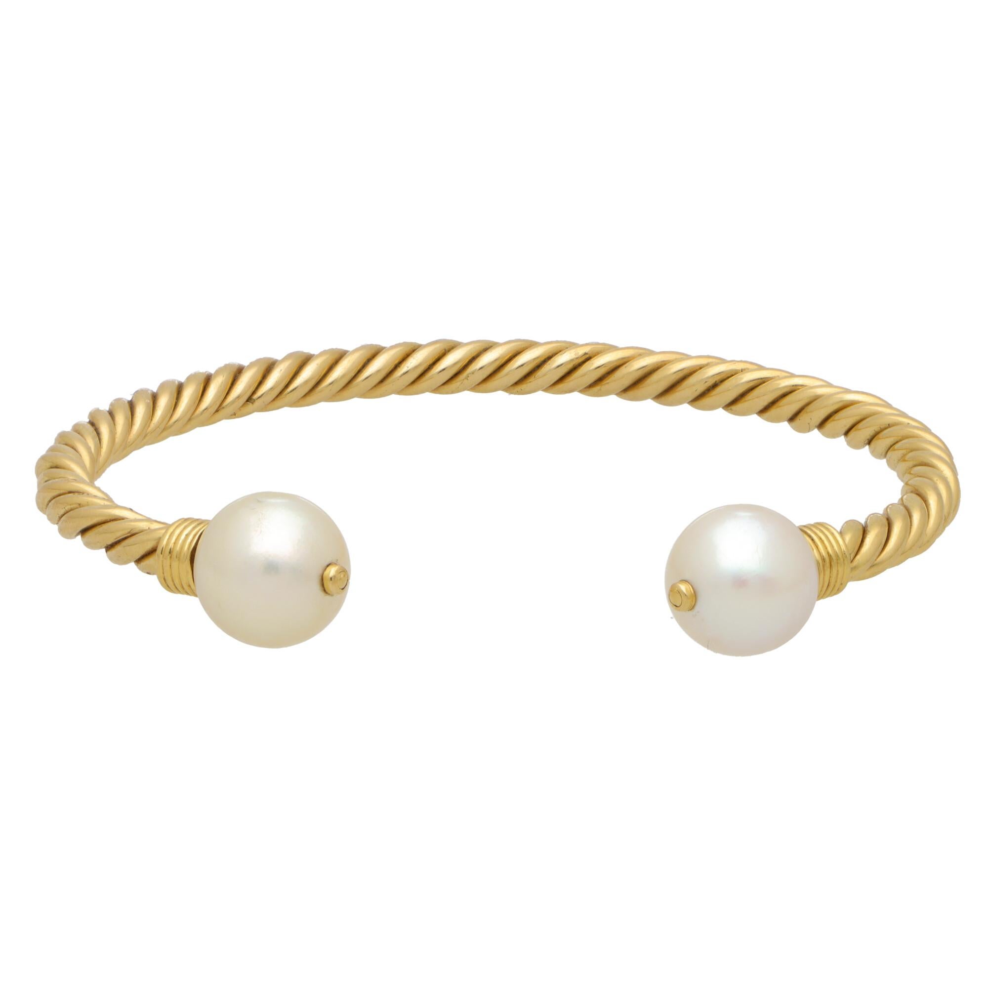 Perle Bvlgari Bracelet jonc vintage torsadé en or jaune 18 carats avec perles en forme de corde torsadée en vente