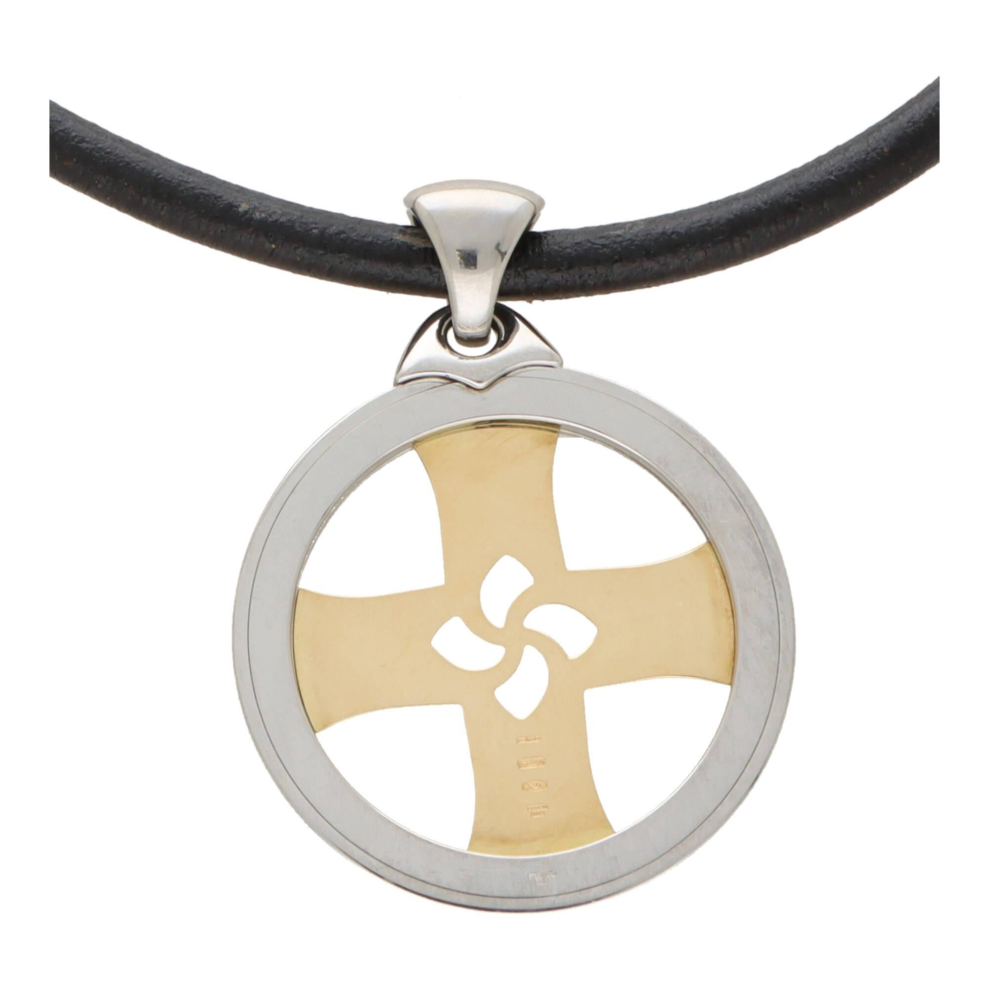 Modern Vintage Bvlgari 'Tondo' Cross Necklace Set in Yellow Gold and Stainless Steel