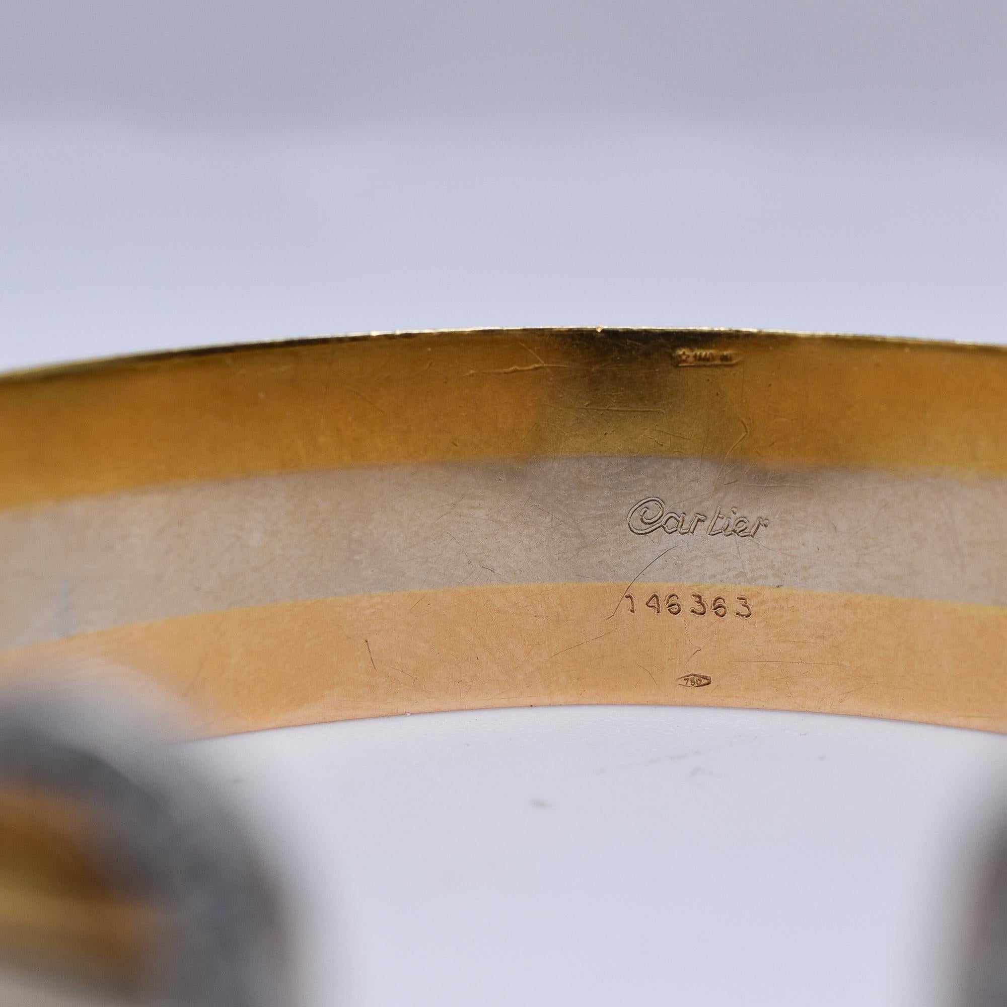 Vintage 'C de Cartier'  Diamond Trinity Bangle in Three Tones 18k Gold In Good Condition For Sale In New York, NY