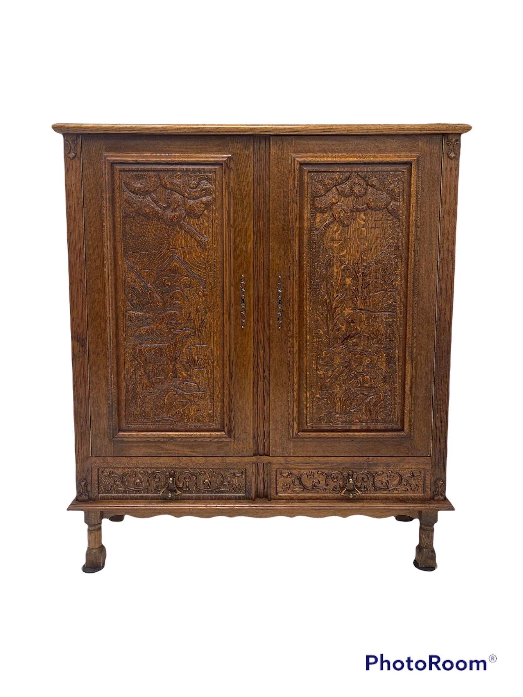 Mid-Century Modern Vintage Cabinet from Germany with Hand Carved Motifs, circa 1930s For Sale