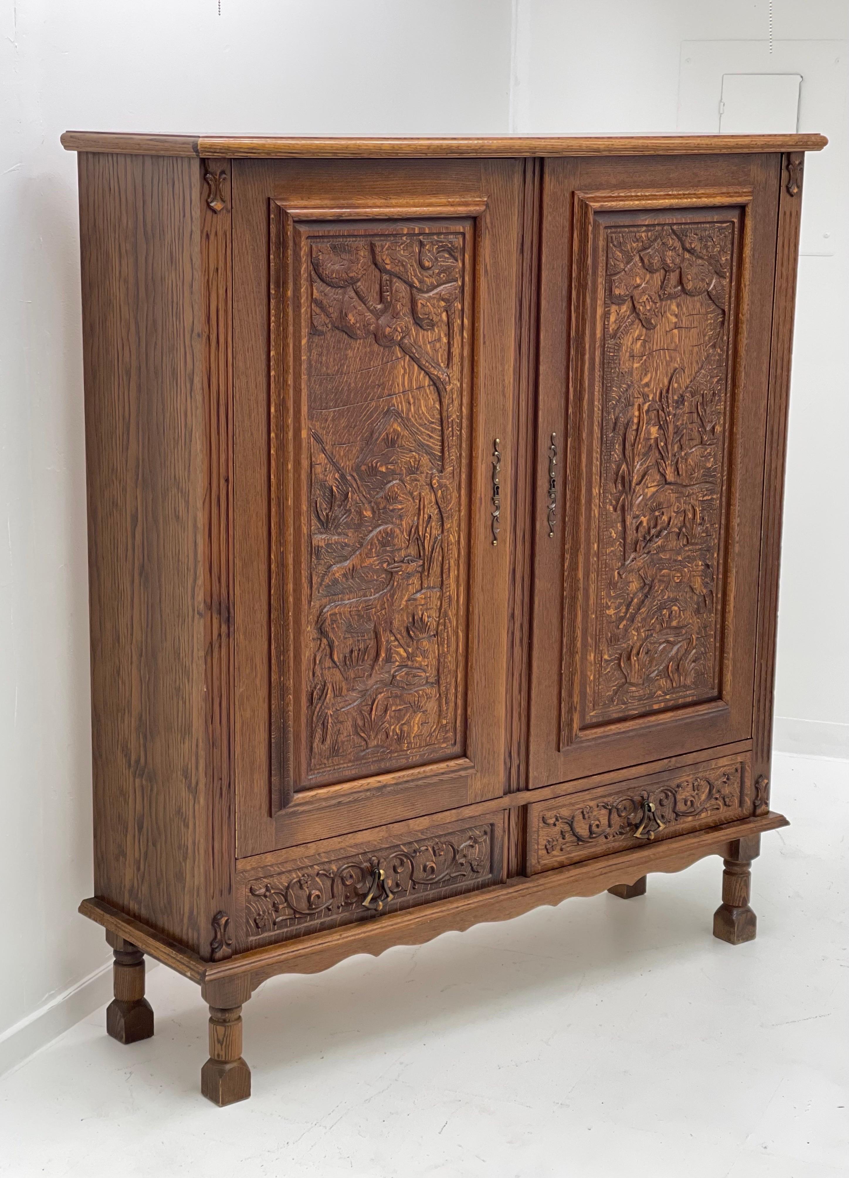 Vintage Cabinet from Germany with Hand Carved Motifs, circa 1930s In Good Condition For Sale In Seattle, WA