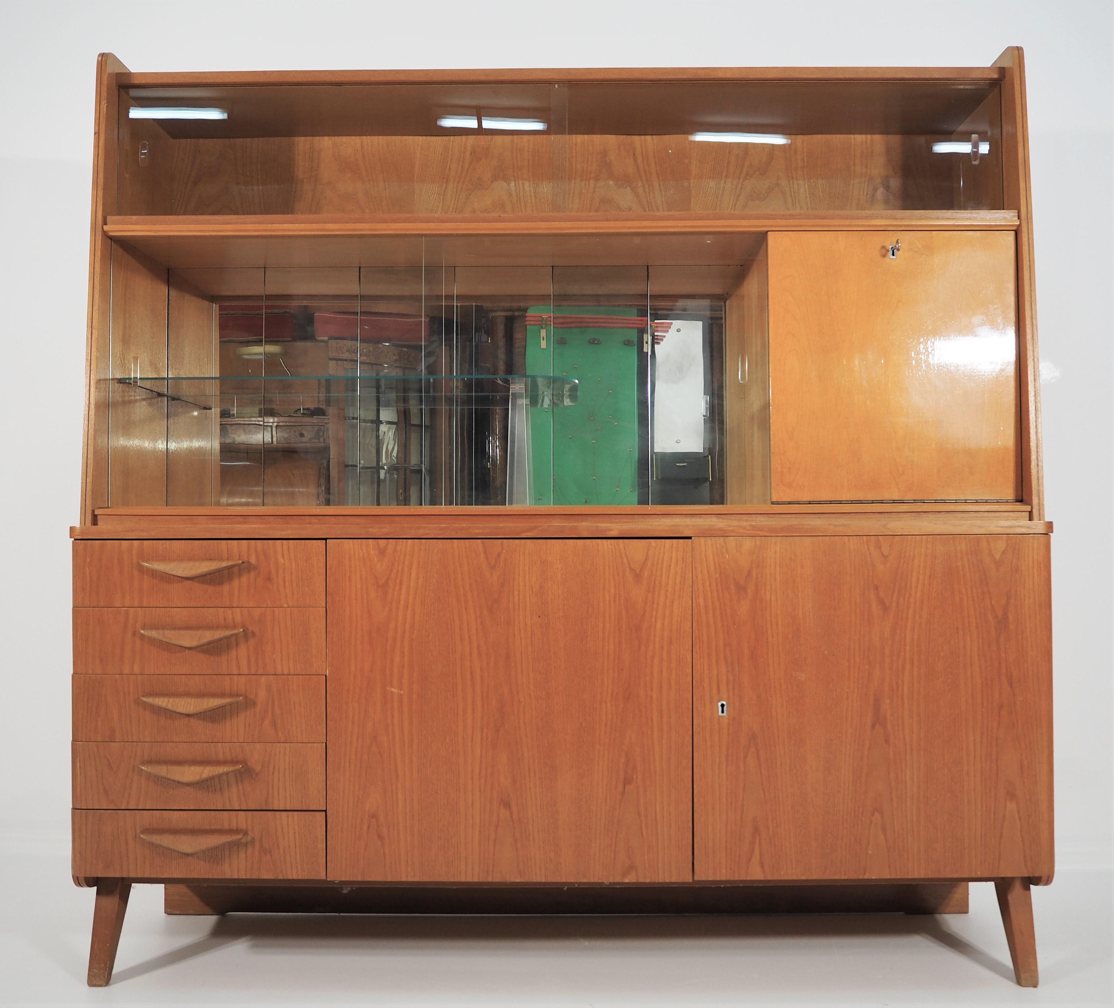 Vintage cabinet from Tatra, 1960s. The cabinet in a rare original. Dimensions: height 158cm, width 159cm, depth 49 cm.
  