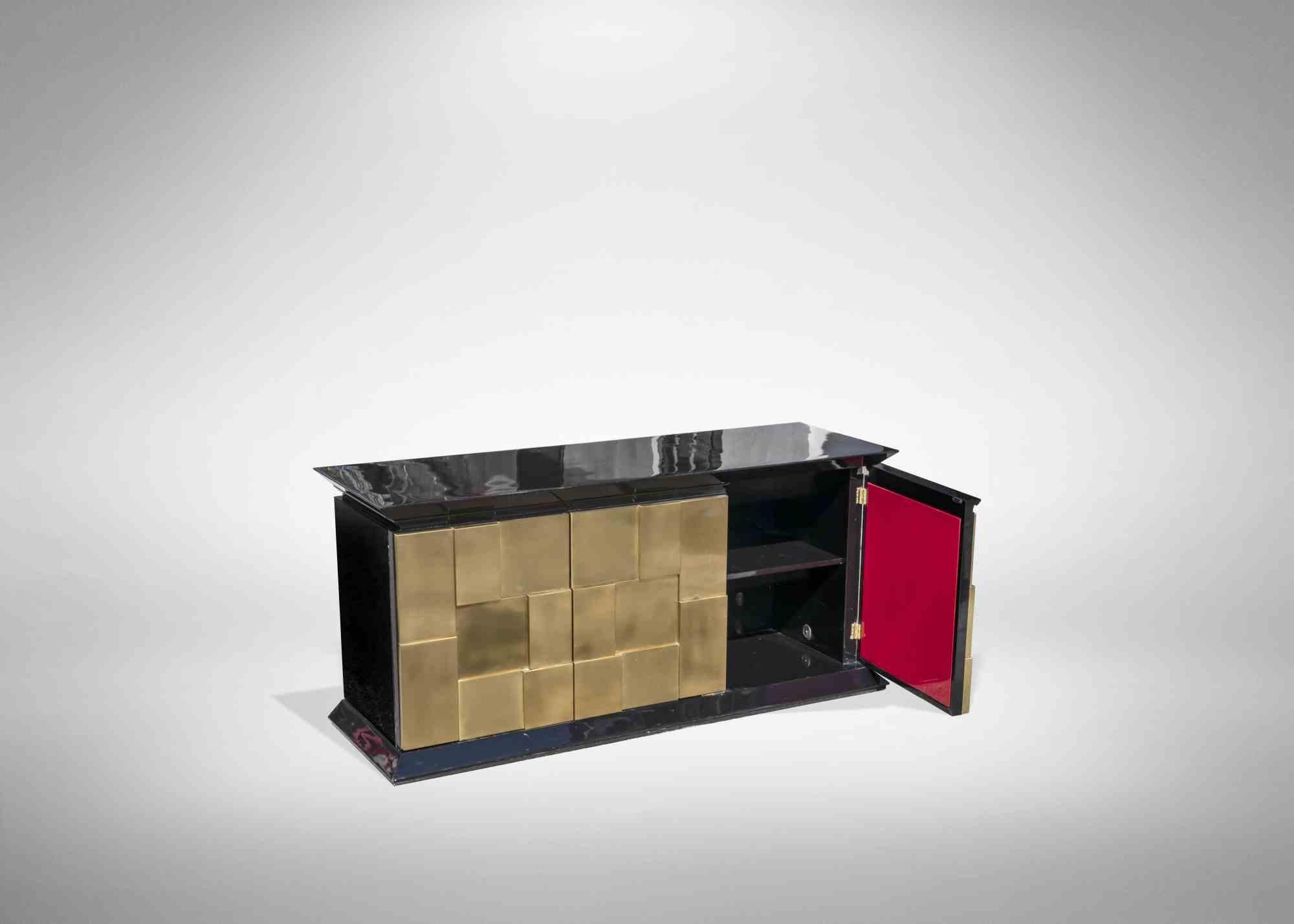 Cabinet set is an original contemporary designer's furniture realized in Italy in the 1970s by Luciano Frigerio (1928–1999).

A vintage sideboard realized in black lacquered tops and brushed brass paneling on the front.

Made in