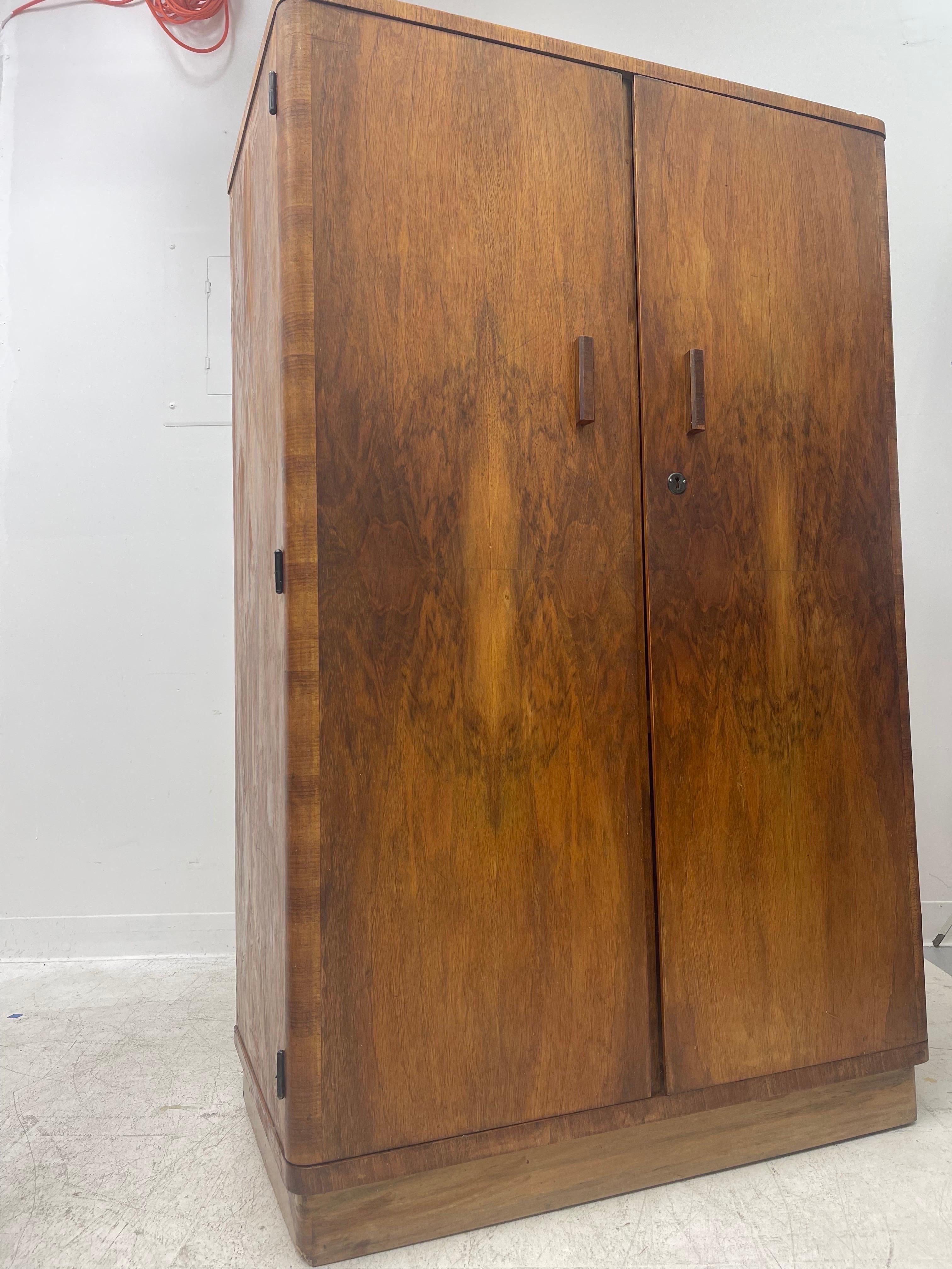 Vintage cabinet gorgeous wood grain.
Dimensions. 34 W ; 54 H ; 18 D.