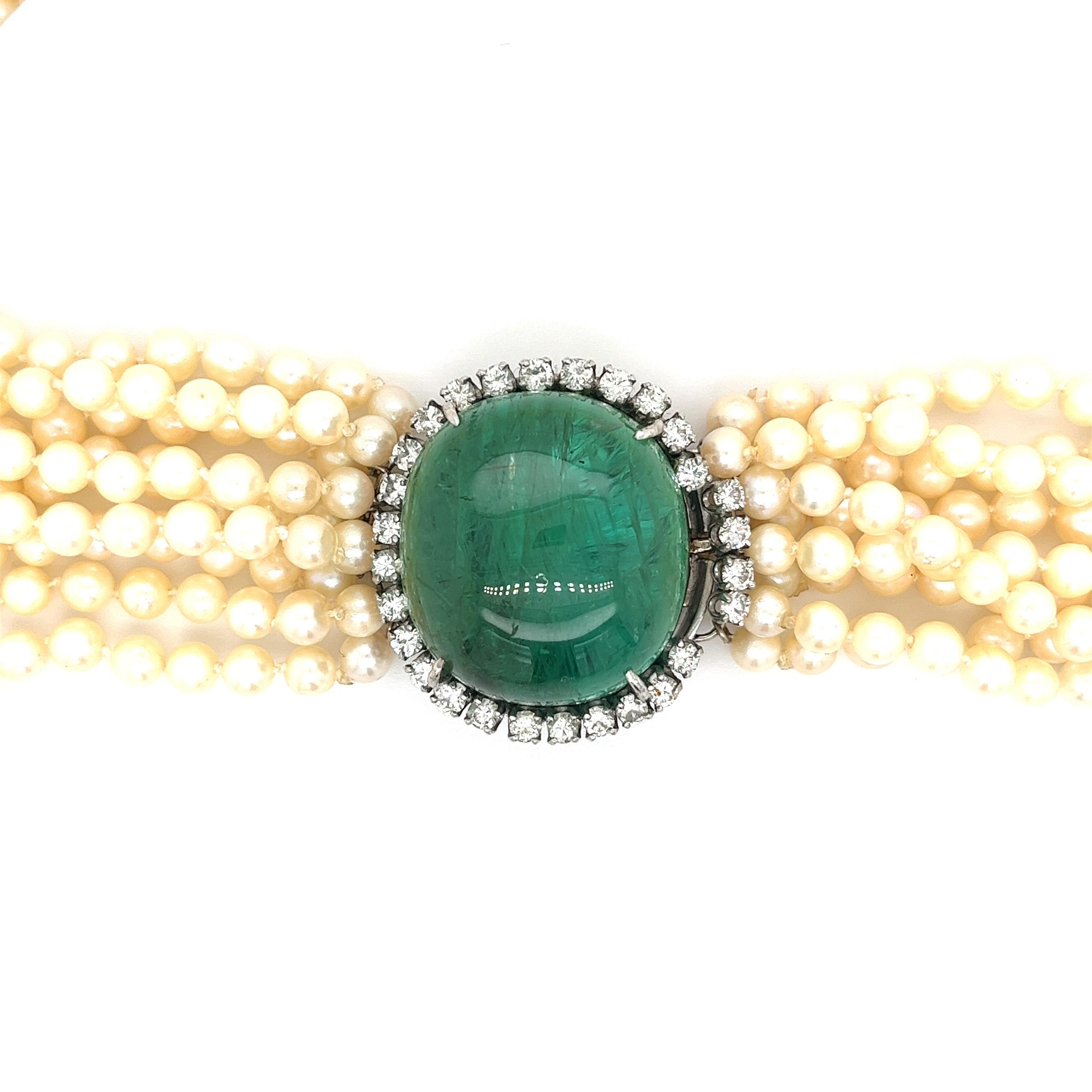 Cabochon cut South American Emerald and Diamond Halo ladies necklace. Vintage circa 1970, with a modernist Retro & Art Deco era inspiration. The perfect heirloom vintage statement piece for special occasions. 

Necklace Details: 
✔ Metal: 14k White