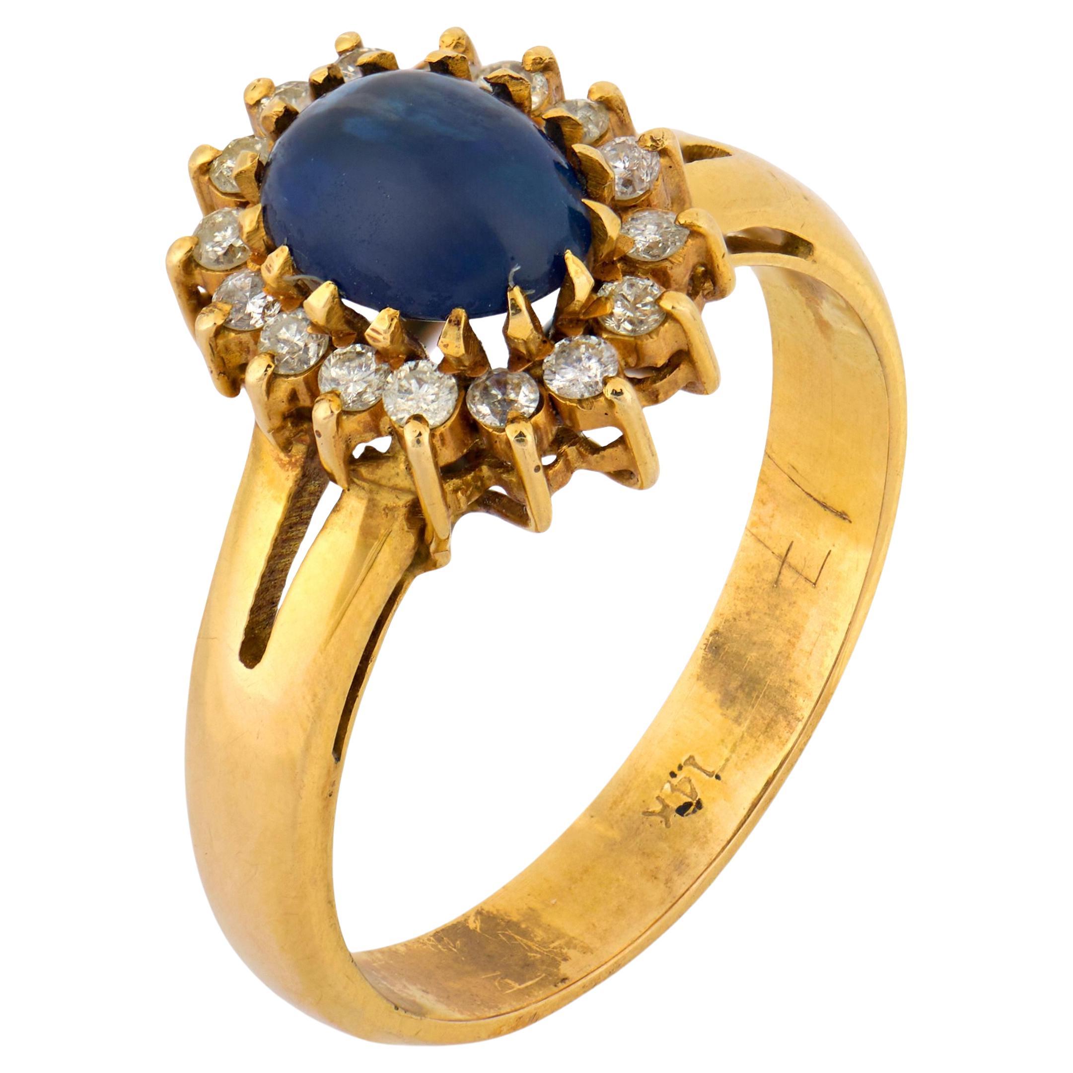 Anello a grappolo d
oro 14k con zaffiro taglio cabochon vintage e diamante