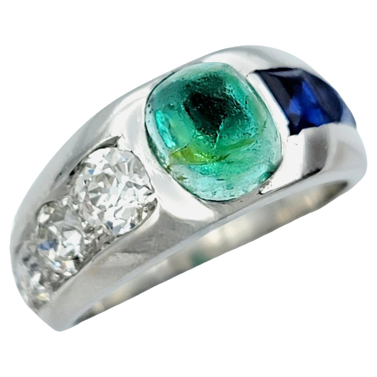 Ring Size: 5.25

This vintage platinum ring exudes elegance and luxury and is sure to make a unique addition to your fine jewelry collection. At its heart lies a mesmerizing cabochon emerald, radiating with natural beauty and captivating allure.