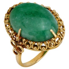 Anello cocktail d'epoca in giada cabochon e oro giallo 18 carati