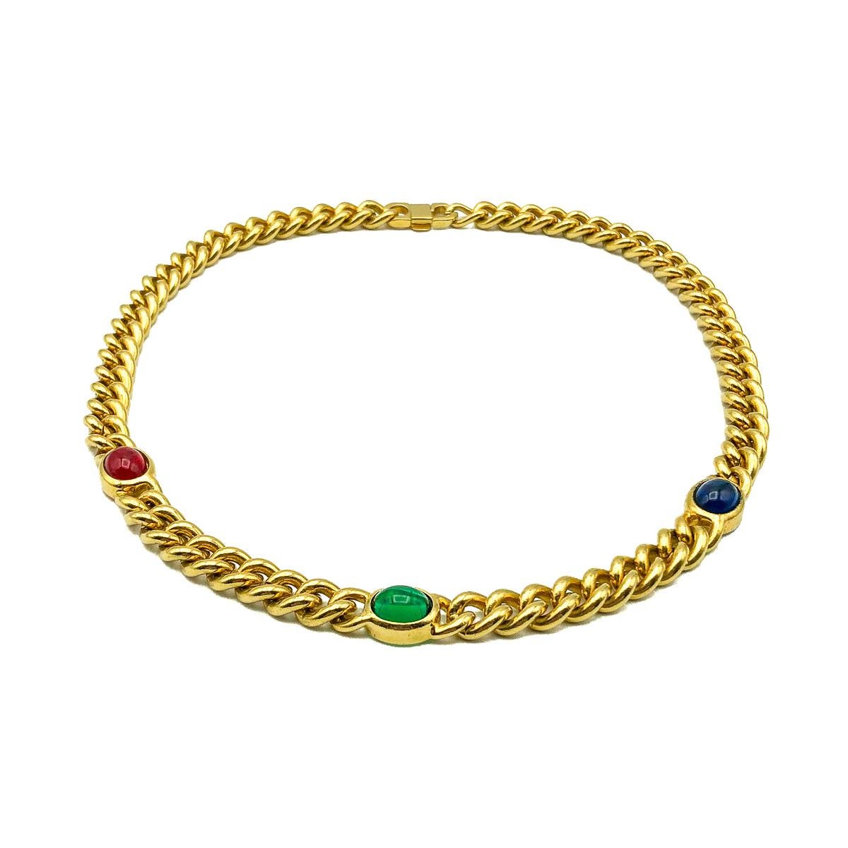 A Vintage Jewelled Chunky Chain. Crafted in gold plated metal with red, green and blue glass cabochon stones emulating sapphire, ruby and emerald. In very good vintage condition, approx. 44cm. A perfect piece to wear layered or alone that is sure to