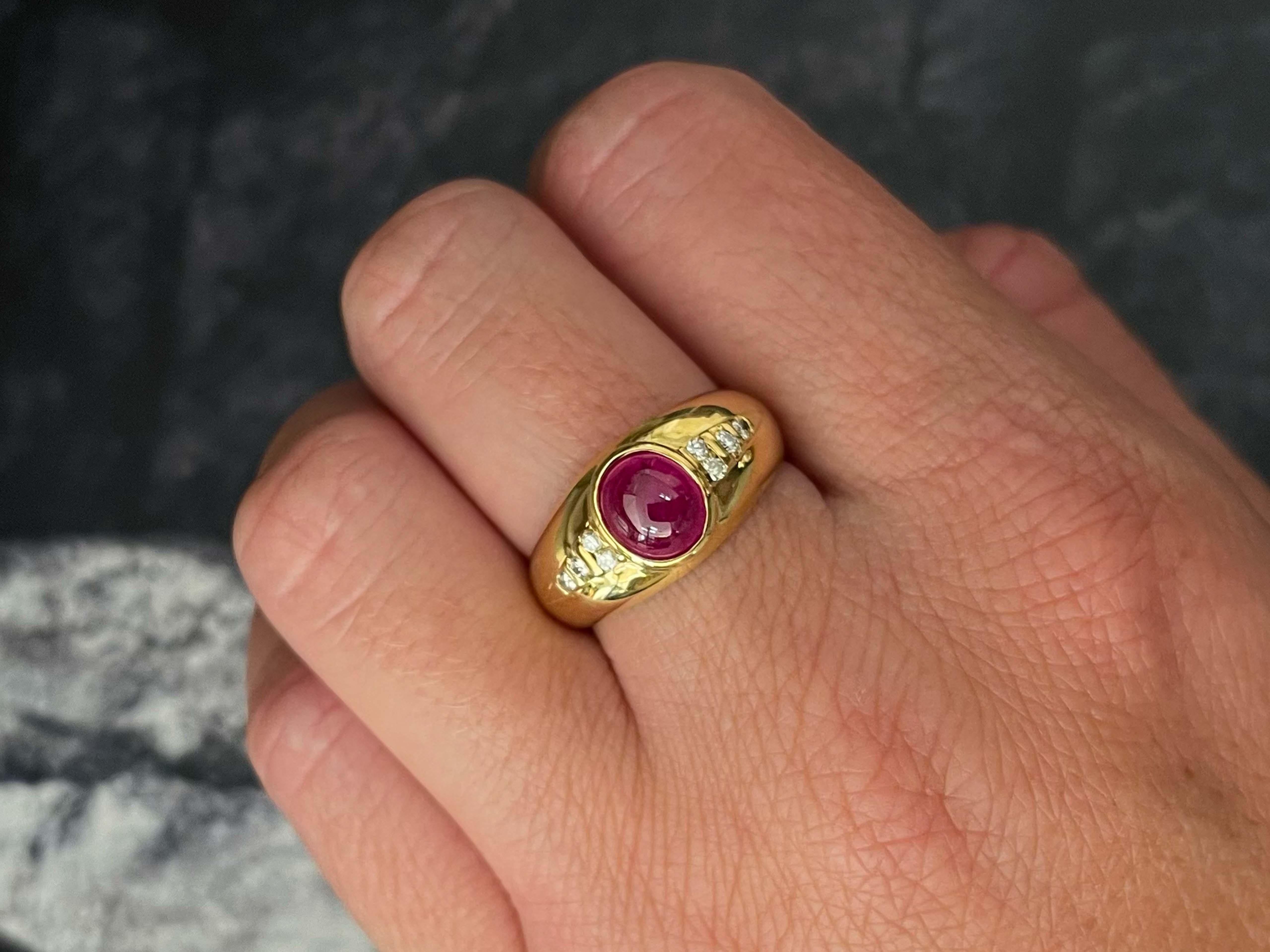 Item Specifications:

Metal: 18K Yellow Gold

Style: Statement Ring

Ring Size: 7.75 (resizing available for a fee)

Total Weight: 7.2 grams

Diamond Carat Weight: 0.16 carats

Diamond Color: G

Diamond Clarity: VS

Gemstone Specifications:
​
Ruby