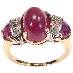 Vintage Cabochon Ruby and Diamond Three-Stone Ring