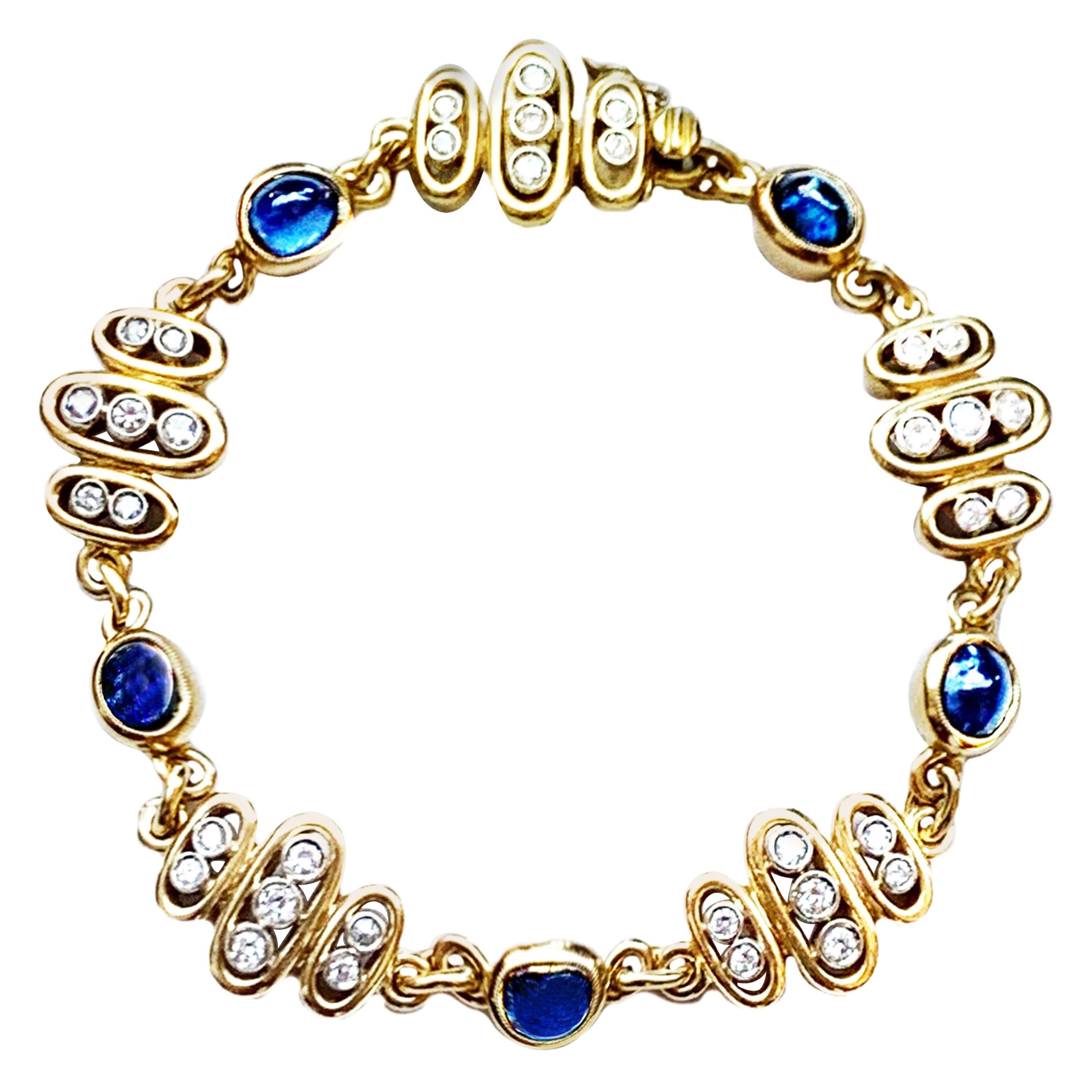 Bracciale vintage con zaffiro cabochon e diamante in oro giallo e bianco 18 Kt