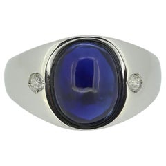 Anello con zaffiro cabochon e diamante vintage