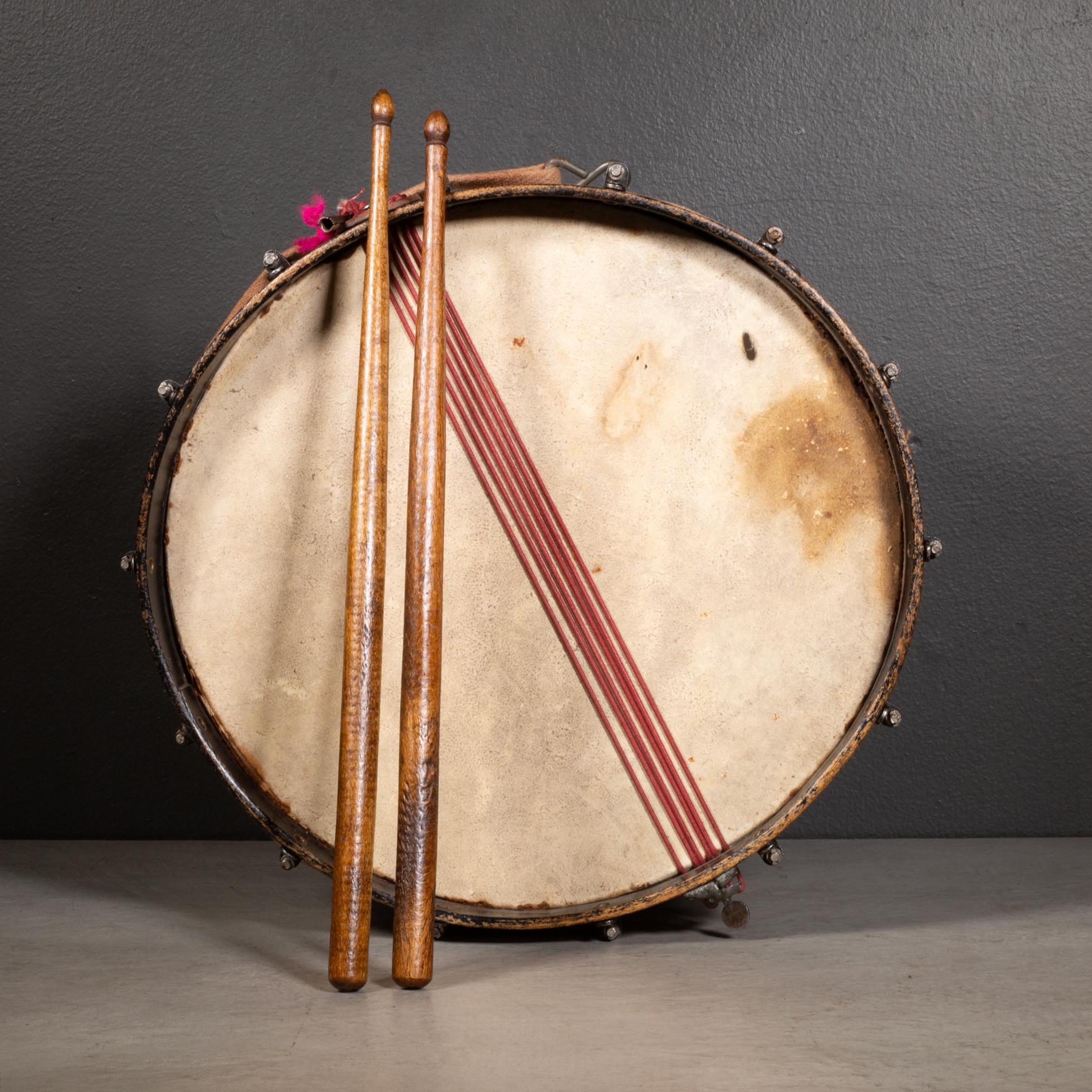 ABOUT

Vintage wood, chrome and stretched calfskin snare drum with small leather plaque, attached key and stamped 