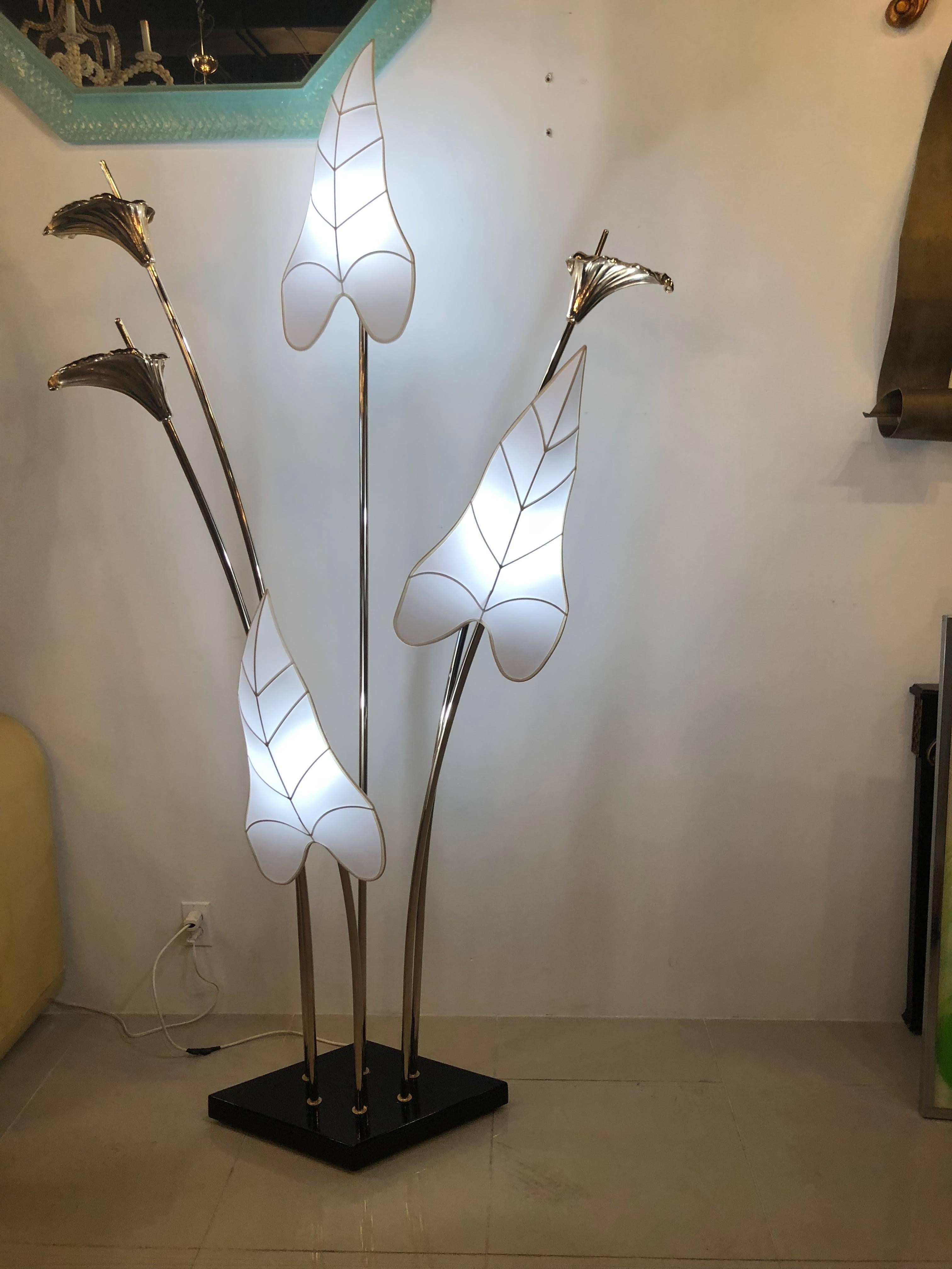 Vintage Italian brass calla lily floor lamp. Newly rewired. The leaf shades are cloth.
 