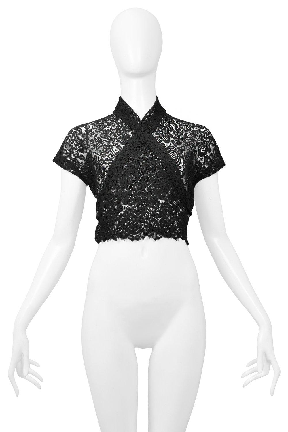 Resurrection Vintage is excited to offer a vintage Romeo Gigli black lace wrap top featuring overlapping front panels, side buttons closure, and shawl collar.

Romeo Gigli
Size Small
Lace Stretch
Excellent Vintage Condition
Authenticity Guaranteed