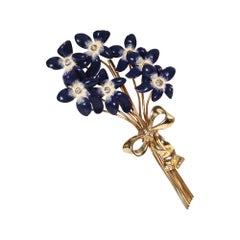 Spilla a fiore vintage Calvaire in oro e smalto blu con diamanti, circa anni '30