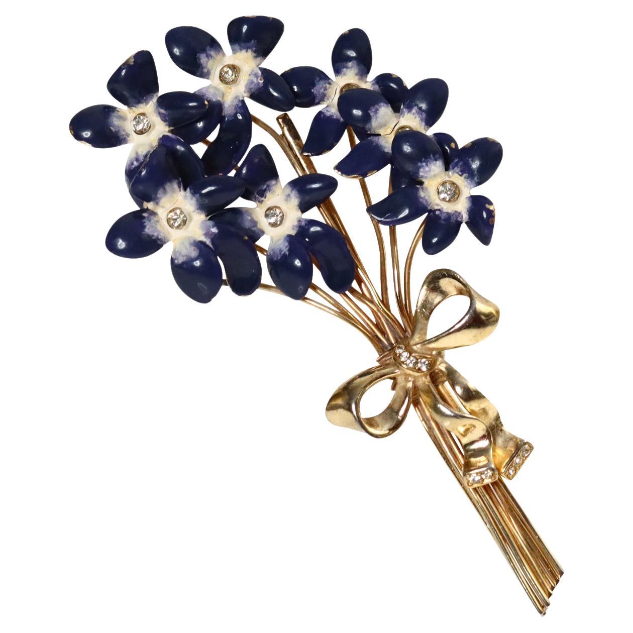 Vintage Calvaire Gold and Diamante Blue Enamel Flower Brooch Circa 1930s For Sale