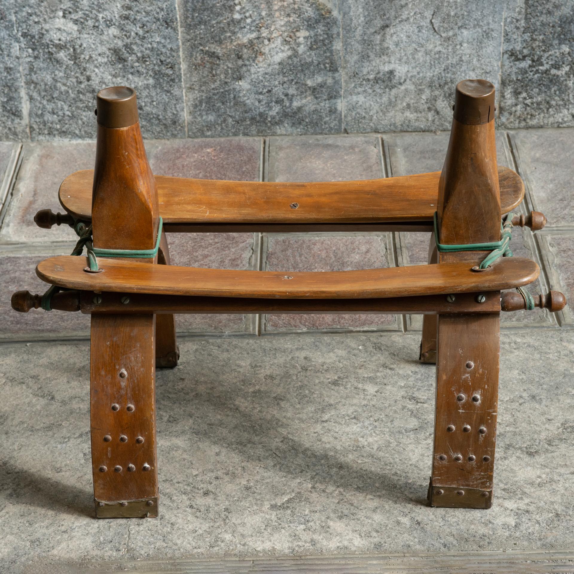 M/1949 -  Vintage Ottoman Moroccan camel leather saddle stool: in original condition, comfortable abd sturdy. The cushion has some slightly worn edges.