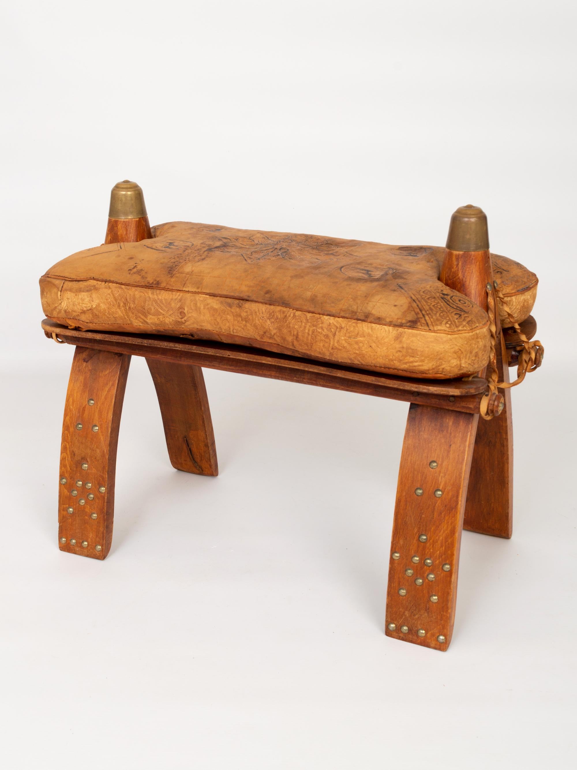A Vintage camel leather saddle stool ottoman, Morocco C.1960.
In very good vintage condition commensurate of age.