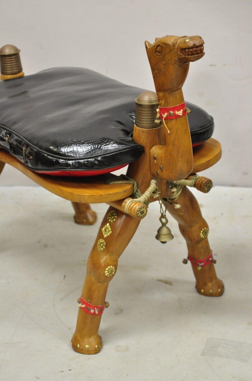 Modern Vintage Camel Saddle Stools Carved Wood Black/Red Cushions, a Pair For Sale
