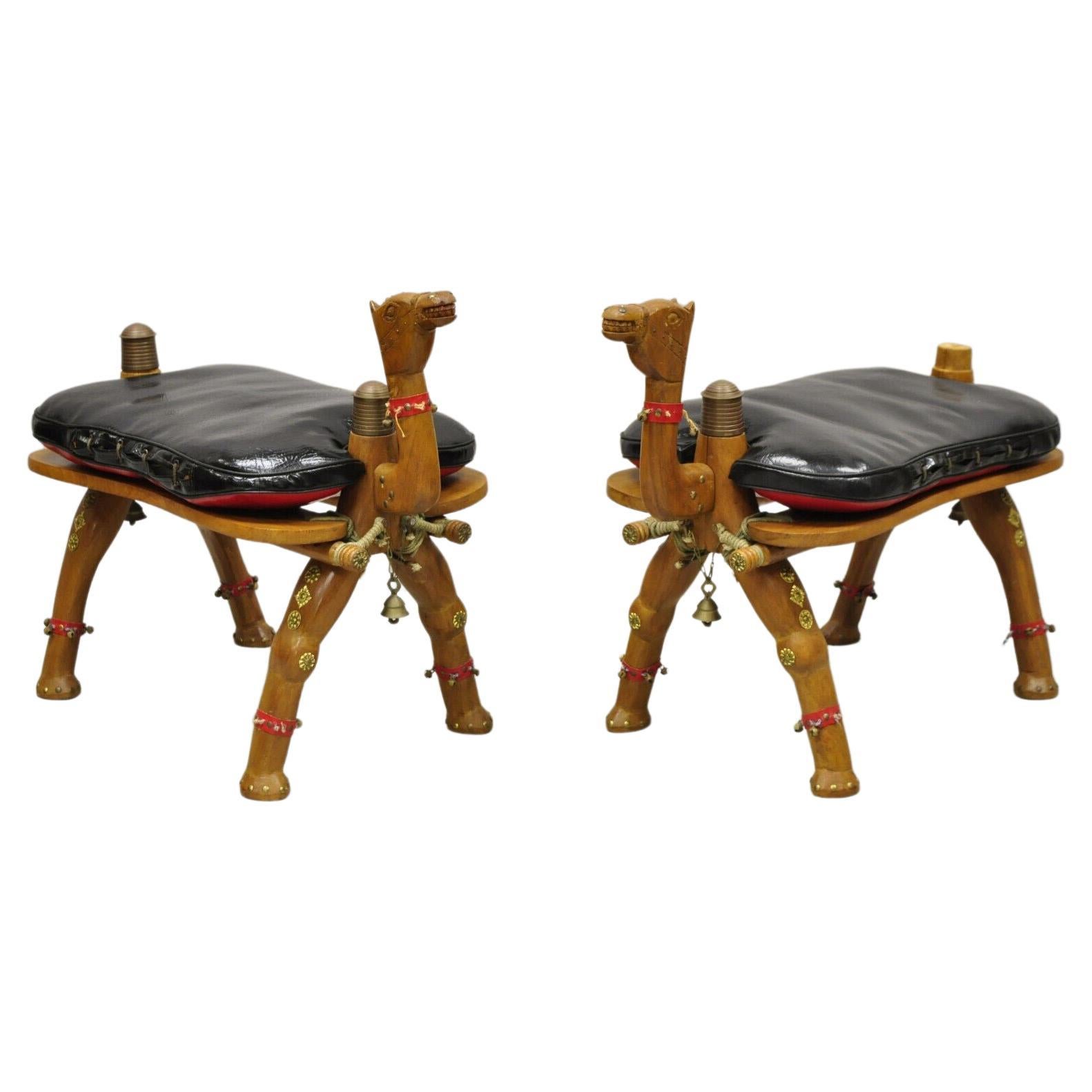 Vintage Camel Saddle Stools Carved Wood Black/Red Cushions, a Pair For Sale