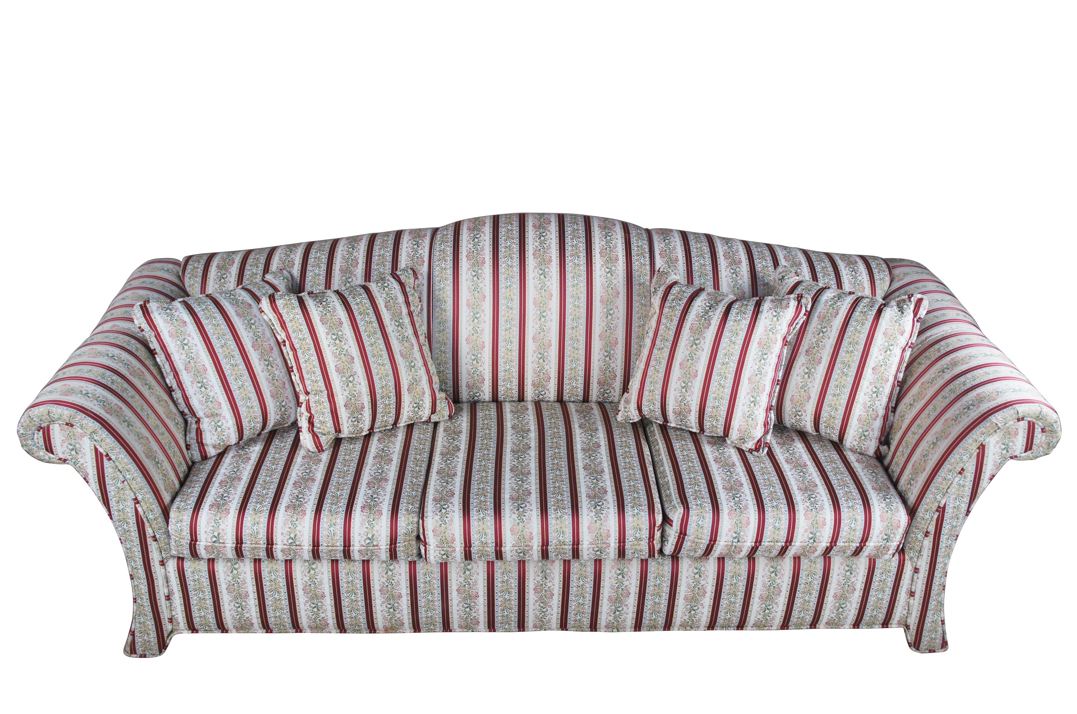 Vintage three seat sleeper sofa / pull out couch with queen size bed featuring Neoclassical styling with rolled arms, camelback and striped floral and ribbon design fabric. 

Dimensions:
33