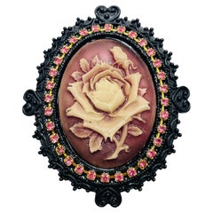 Used cameo rose rhinestone designer brooch