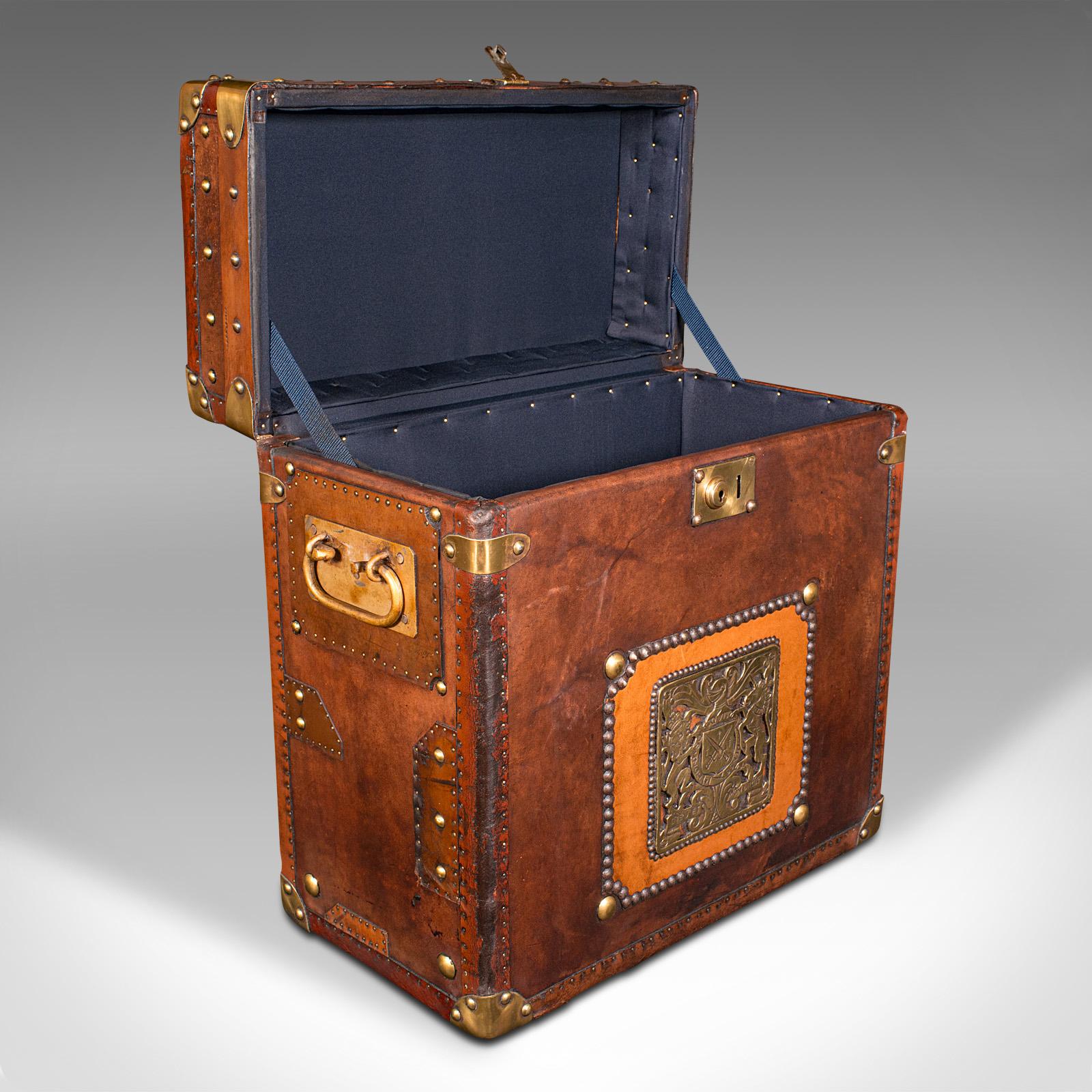 This is a vintage campaign luggage case. An English, leather and brass bedside nightstand, dating to mid 20th century, circa 1960.
 
Delightfully eye-catching and of superior craftsmanship
Displays a desirable aged patina and in good order