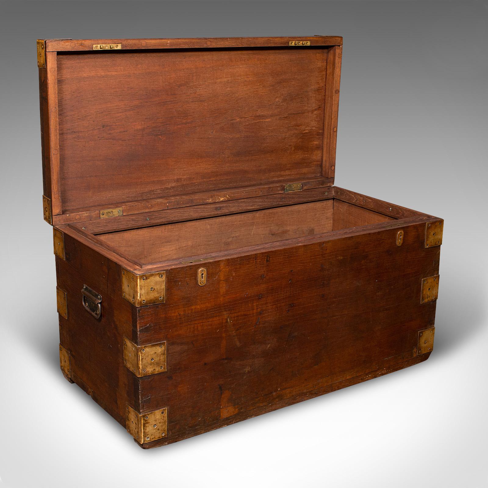 
This is a vintage campaign silver chest. An English, teak and brass capped shipping trunk, dating to the Art Deco period, circa 1940.

Appealing example with superb, stout stocks and eye-catching finish
Displays a desirable aged patina and in good