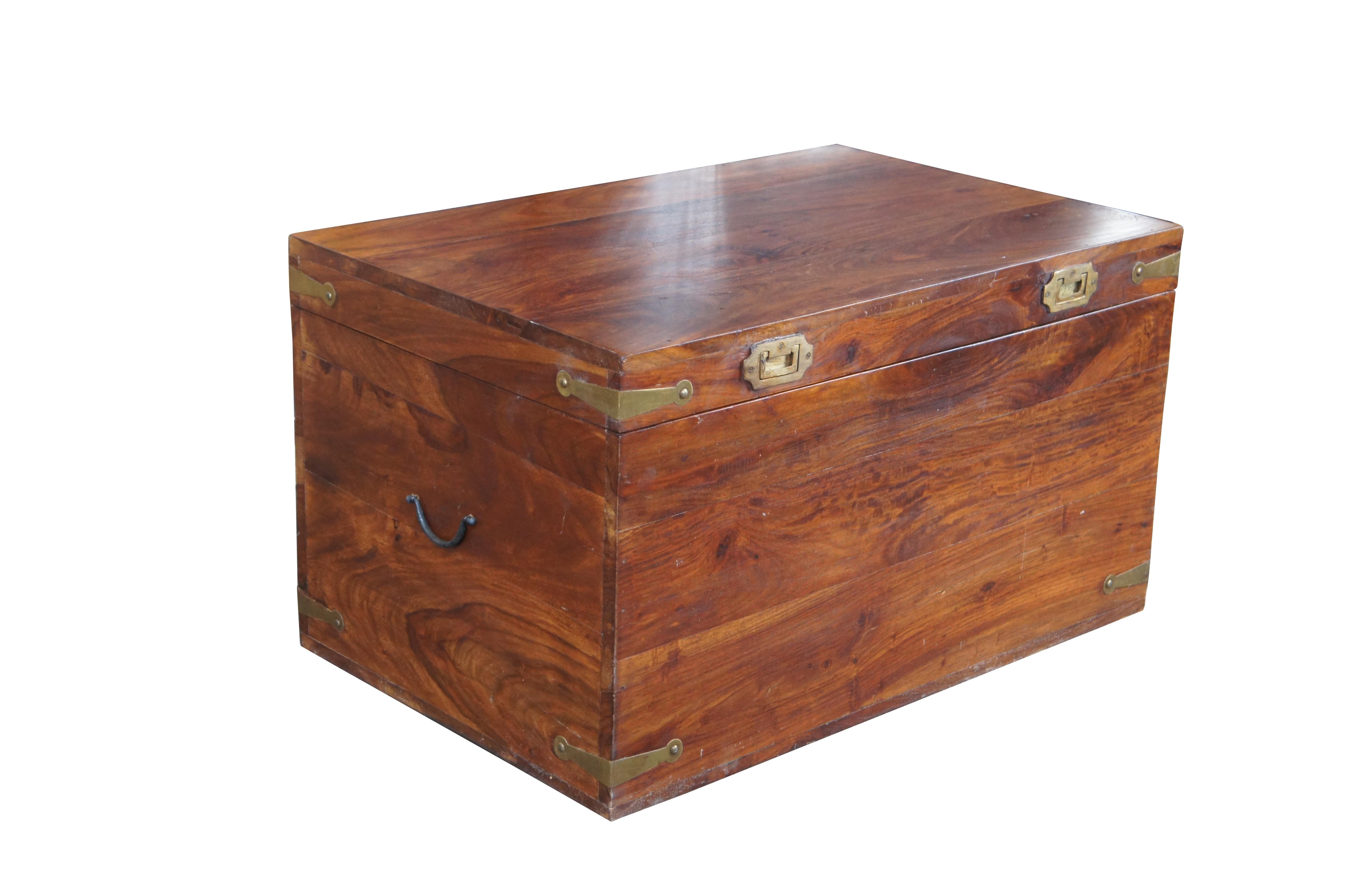 Late 20th century campaign style camphor chest. Features a rectangular frame with brass banded hand hardware and traditional campaign / anglo indian recessed pulls along the front.

Dimensions:
15.5