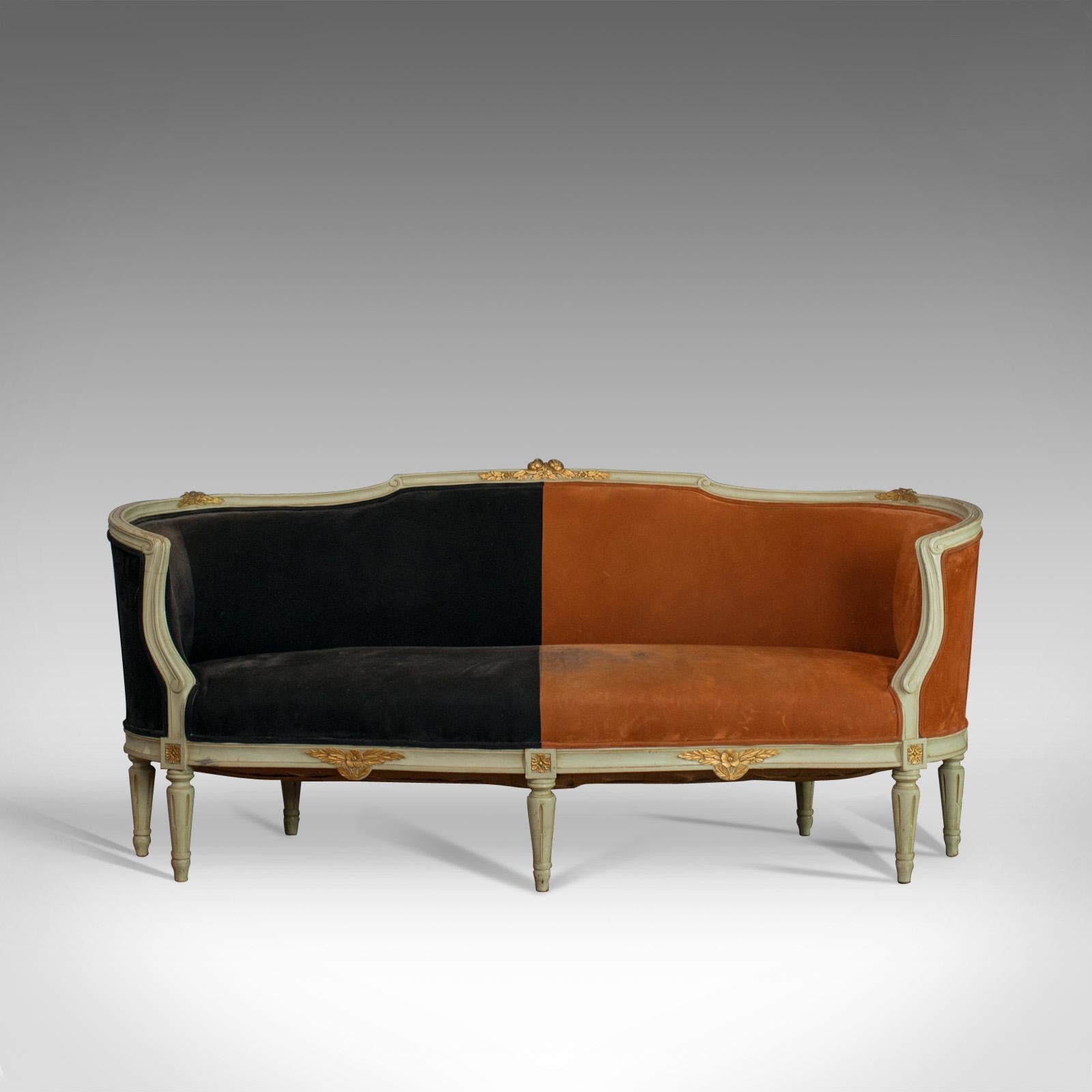 This is a vintage canapé sofa in Louis XV taste. A French, beech and velour two-tone sofa dating to the early 20th century, circa 1930.

Displaying a desirable aged patina and use commensurate with its age
Gilded foliate detail adorns the upper