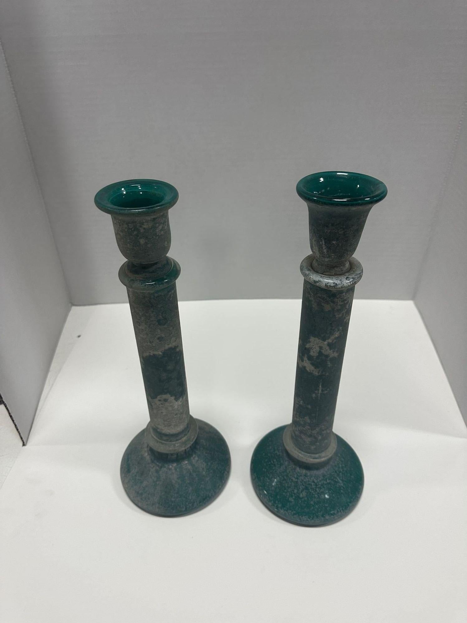 Enhance your interior decor with these charming Vintage Candlesticks with Turquoise Frosted Glass texture. This delightful pair of candle holders exudes a timeless appeal with their elegant frosted glass and beautiful turquoise hue. Perfect for