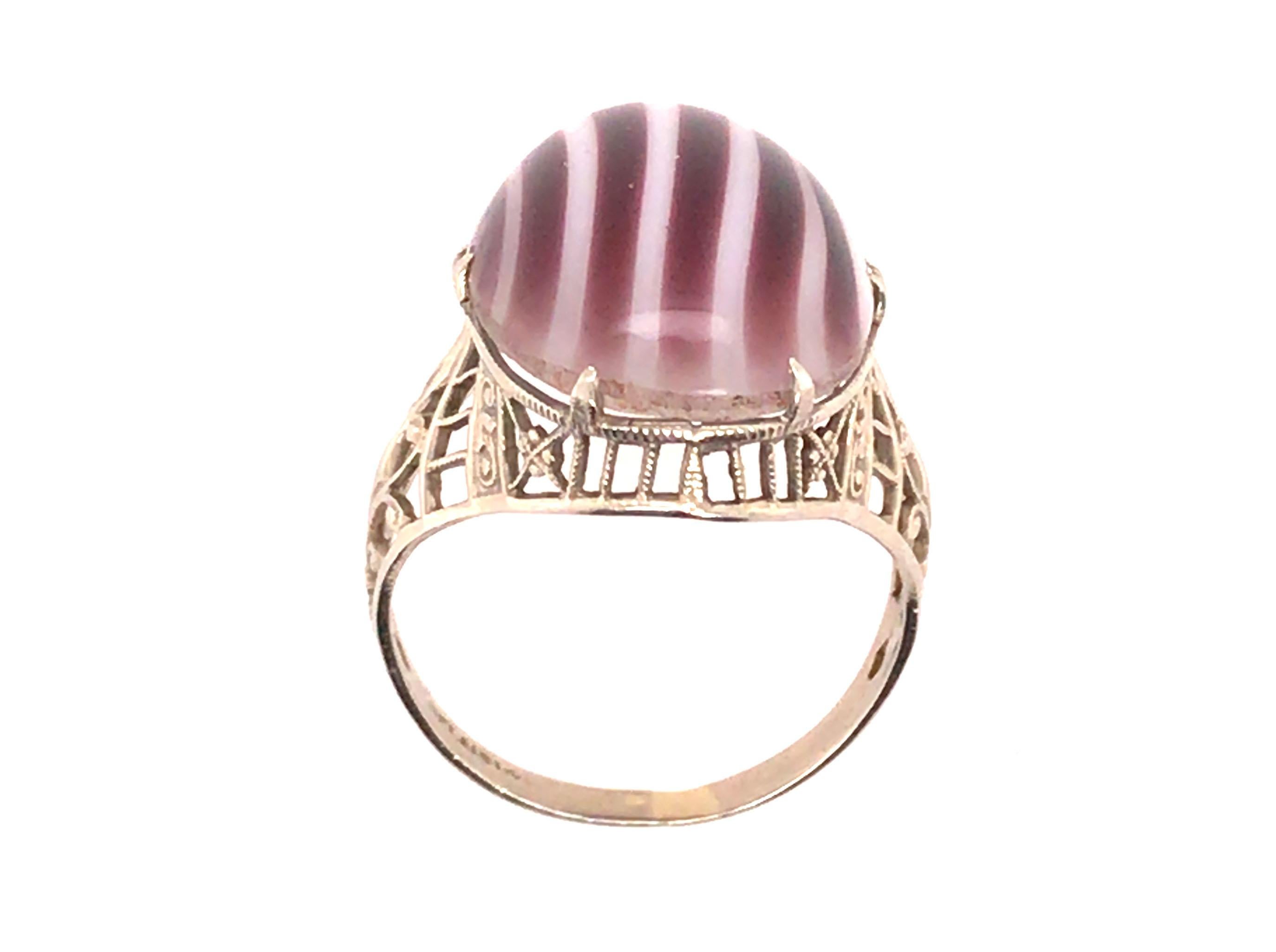Genuine Original Antique from 1920s Candy Cane Art Glass Cocktail Ring Belais Bros 14K White Gold Vintage Art Deco


Featuring a Gorgeous 18 x 13mm Purple & White Candy Cane Stripped Oval Cabochon Art Glass Center

Genuine Belais Bros Ring

The
