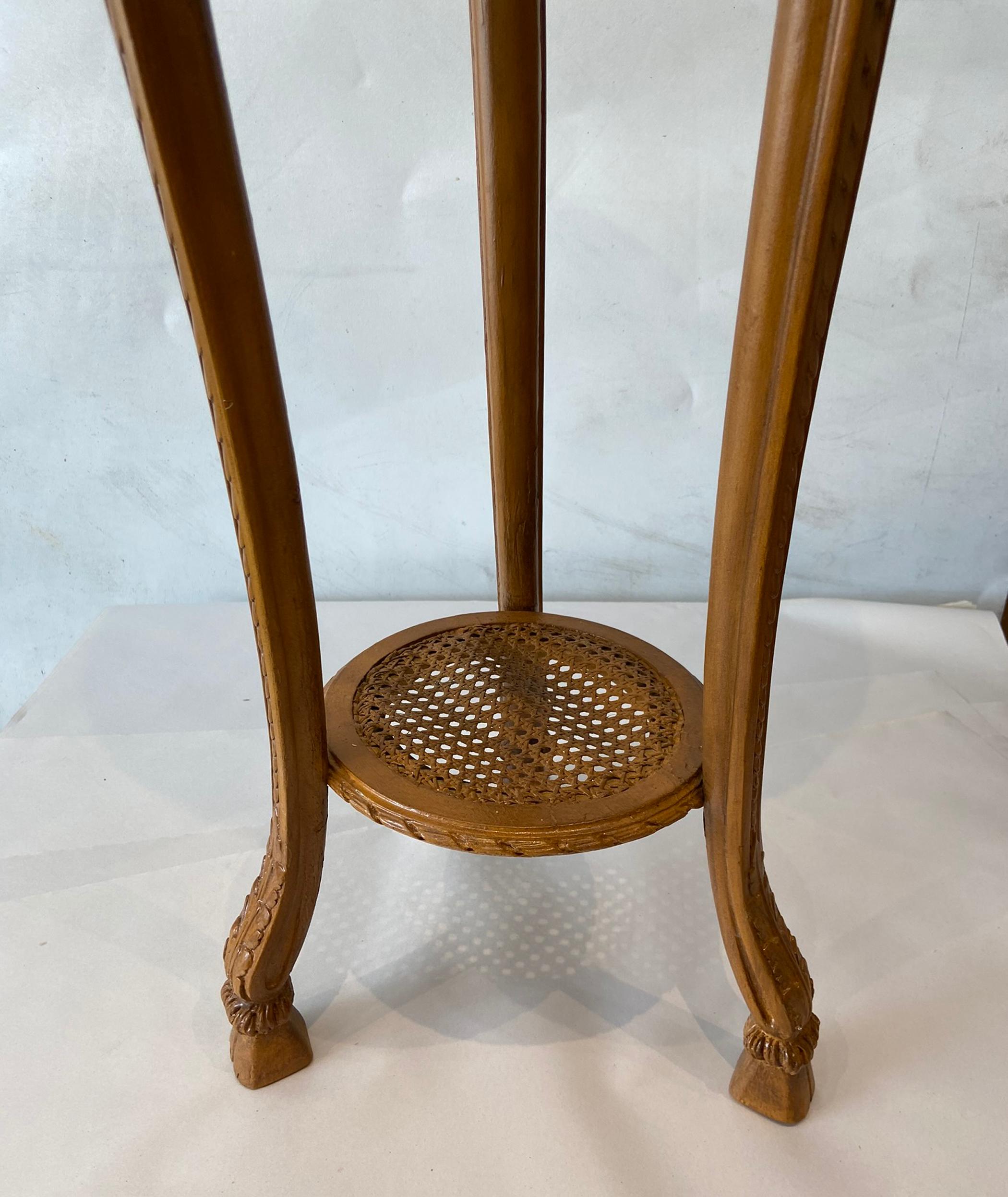 Vintage Cane and Craved Wood Standing Panter In Good Condition In West Palm Beach, FL