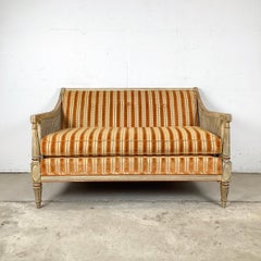Vintage Cane-Arm Louis XVI Style Settee With Carved Frame
