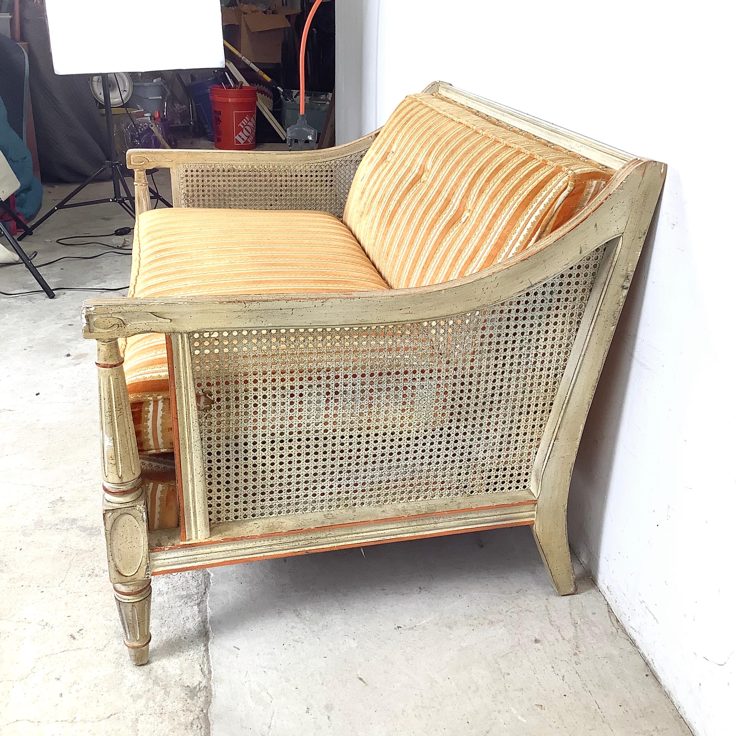 Vintage Cane-Arm Louis XVI Style Settee With Carved Frame (20. Jahrhundert) im Angebot